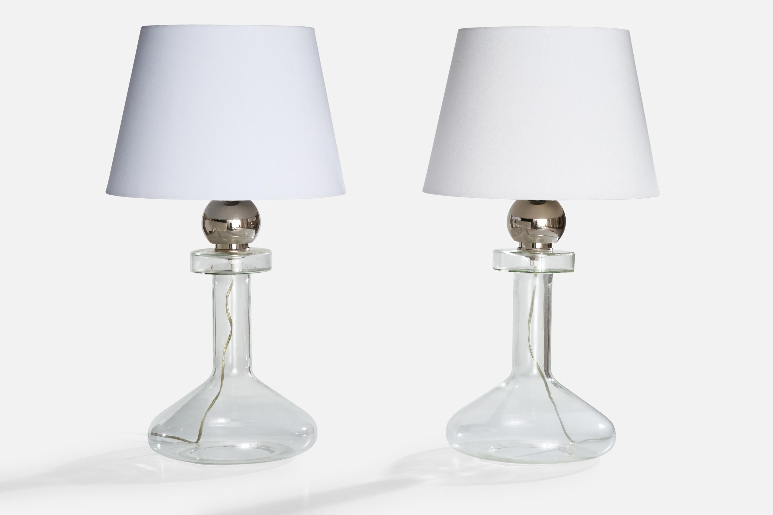 A pair of chome metal and glass table lamps produced by Laurel Lamp Co., USA, c. 1970s.

Sold without Lampshade

Dimensions of Lamp (inches) : 21.5 x 10.5 x 10.5 (Height x Width x Depth) Dimensions of Shade (inches) : 10 x 14 x 10 (Top Diameter x