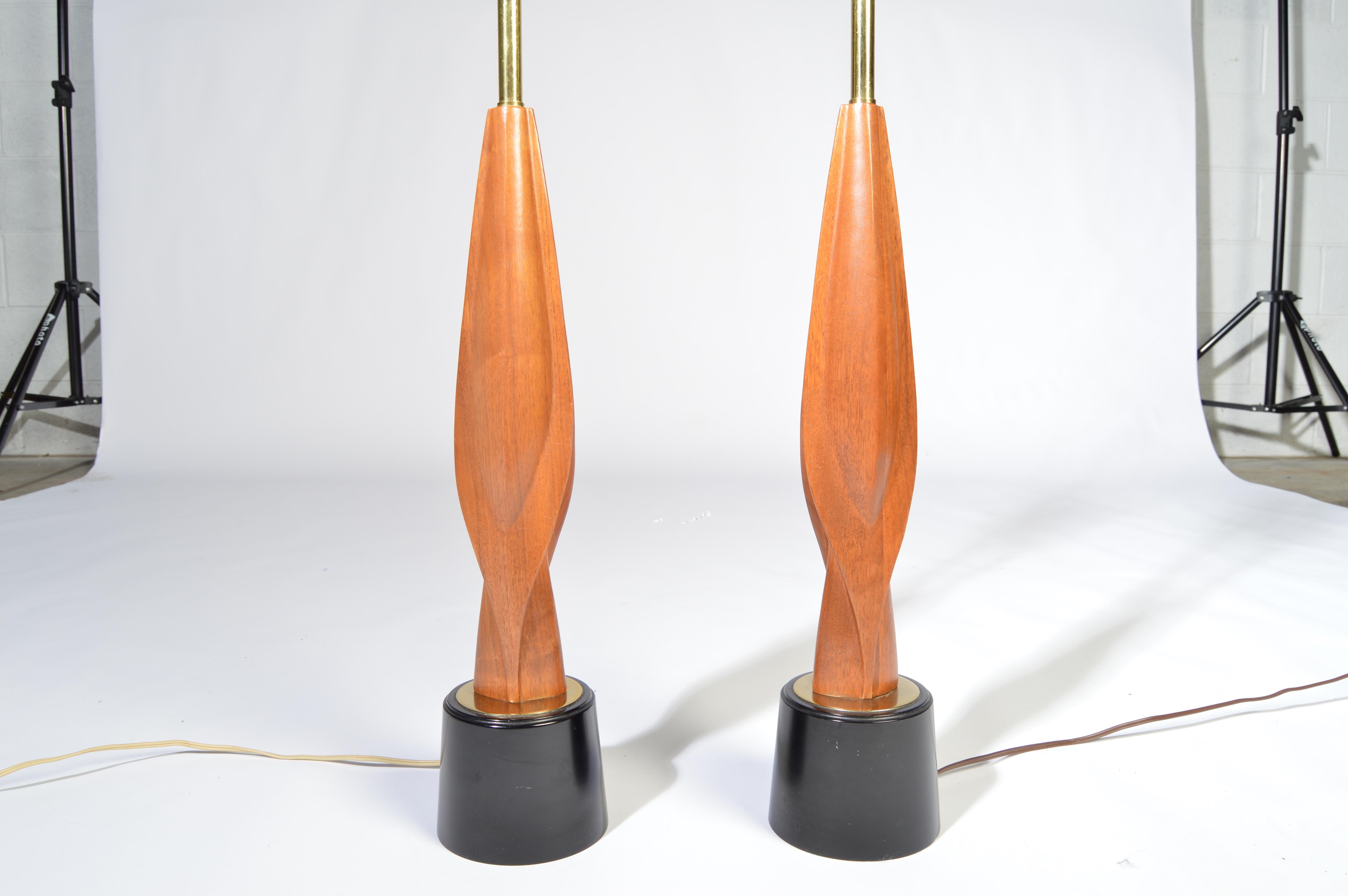 A beautiful pair of sculpted walnut table lamps by Laurel Lamp Co., circa 1960
Outstanding overall condition.
Sculpture height 16”
Sculpture width 4