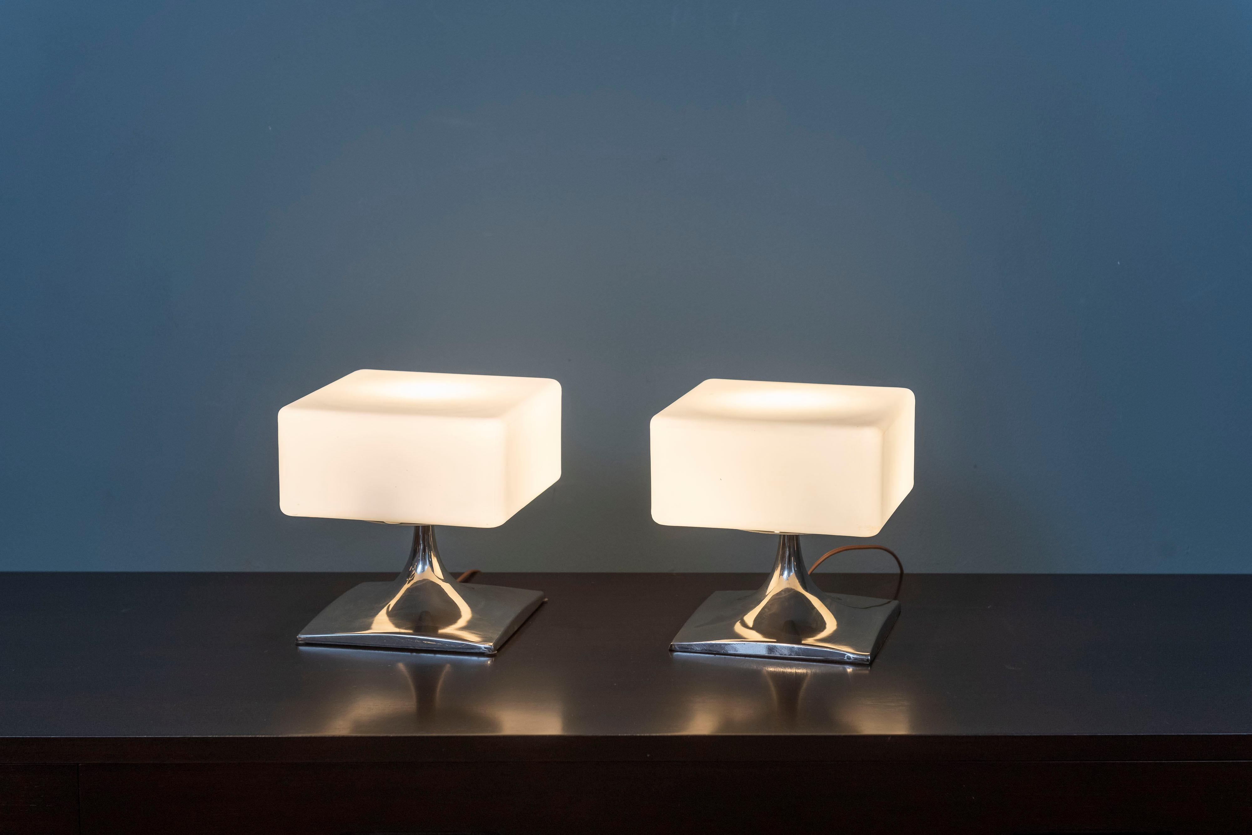 Laurel Lamps a rare pair of lamps equal in height, width and depth. Featuring chrome plated square bases and Italian glass square shades that lock onto the base. Modern and moody perfect for a contemporary or mid-century interior in very good