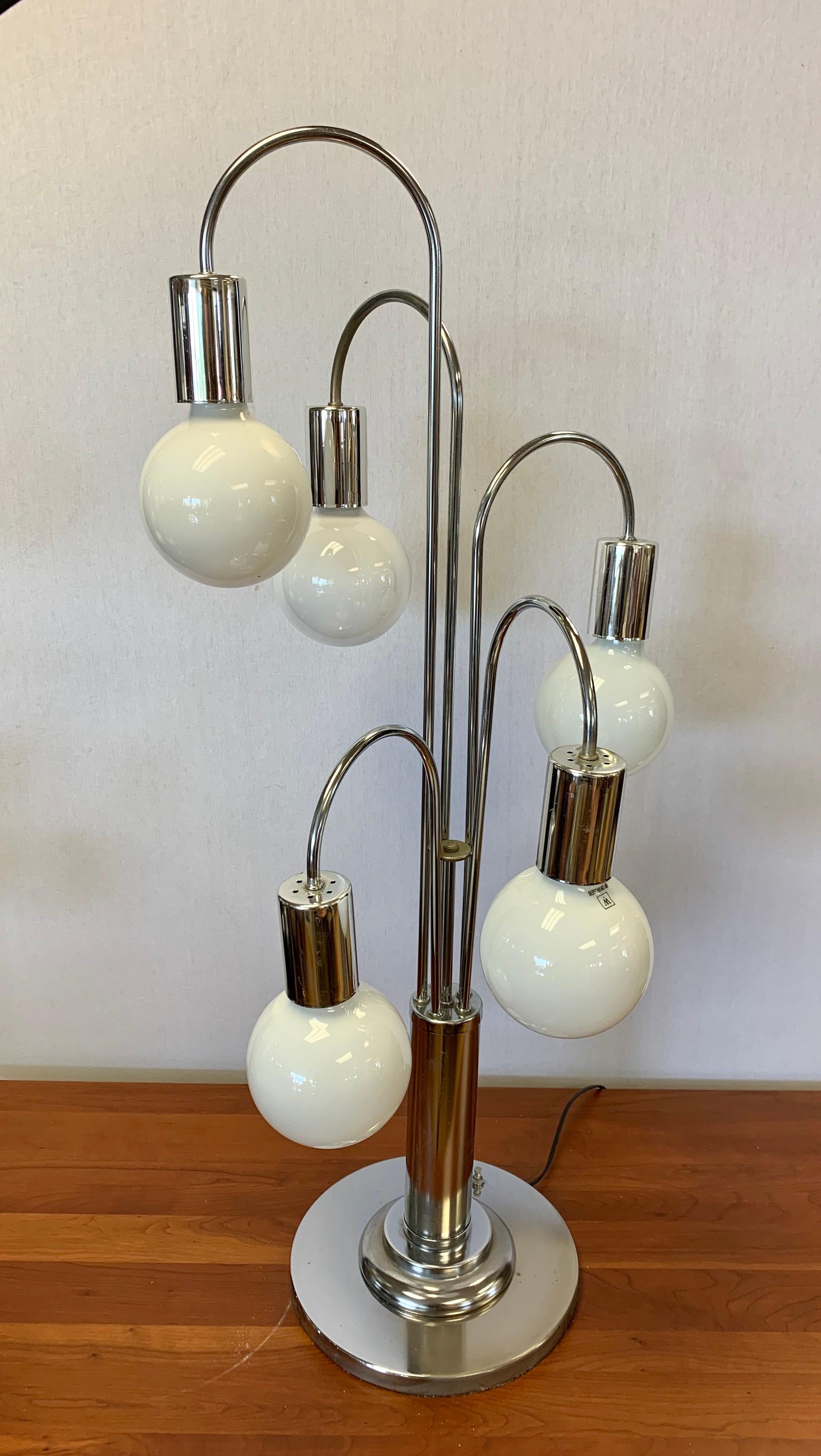 Rare Laurel lamp Company large chrome waterfall table lamp. There are five lights and this piece is made to look a cascading chandelier. It is forty inches tall and nothing short of magnificent. Made and wired in USA and everything works as it