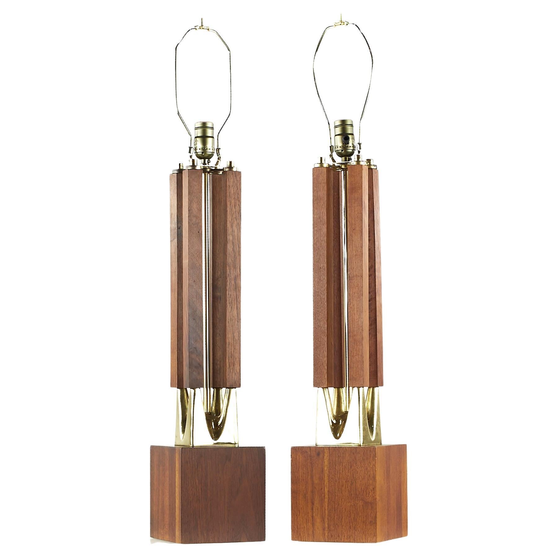 Laurel midcentury Brass and Walnut Table Lamps – Pair

Each lamp measures: 5.75 wide x 5.75 deep x 33.5 inches high

We take our photos in a controlled lighting studio to show as much detail as possible. We do not photoshop out blemishes. 

We
