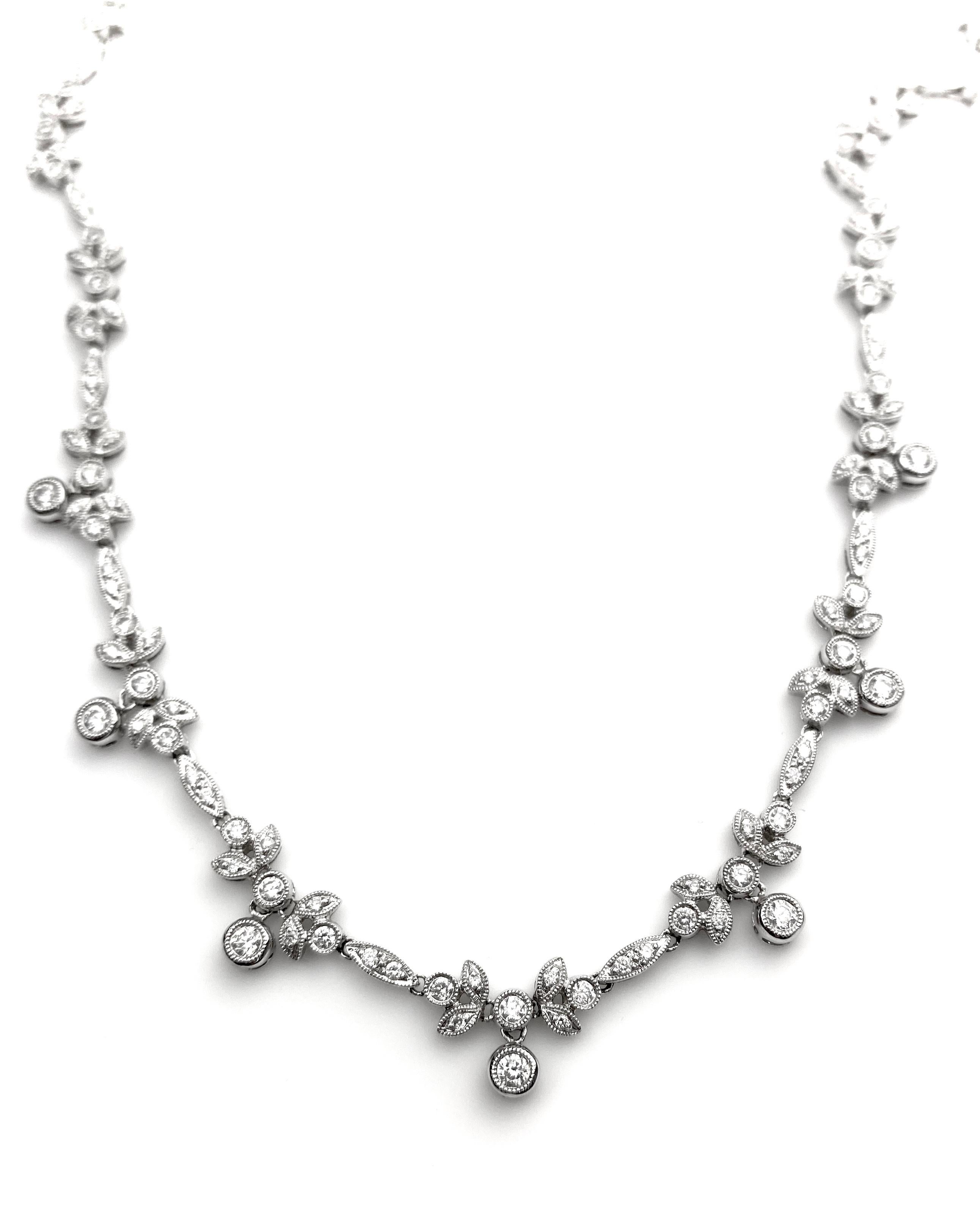 Ladies' laurel motif necklace in 18kt white gold micro-set with 104 diamonds equal to 1.74ct total.