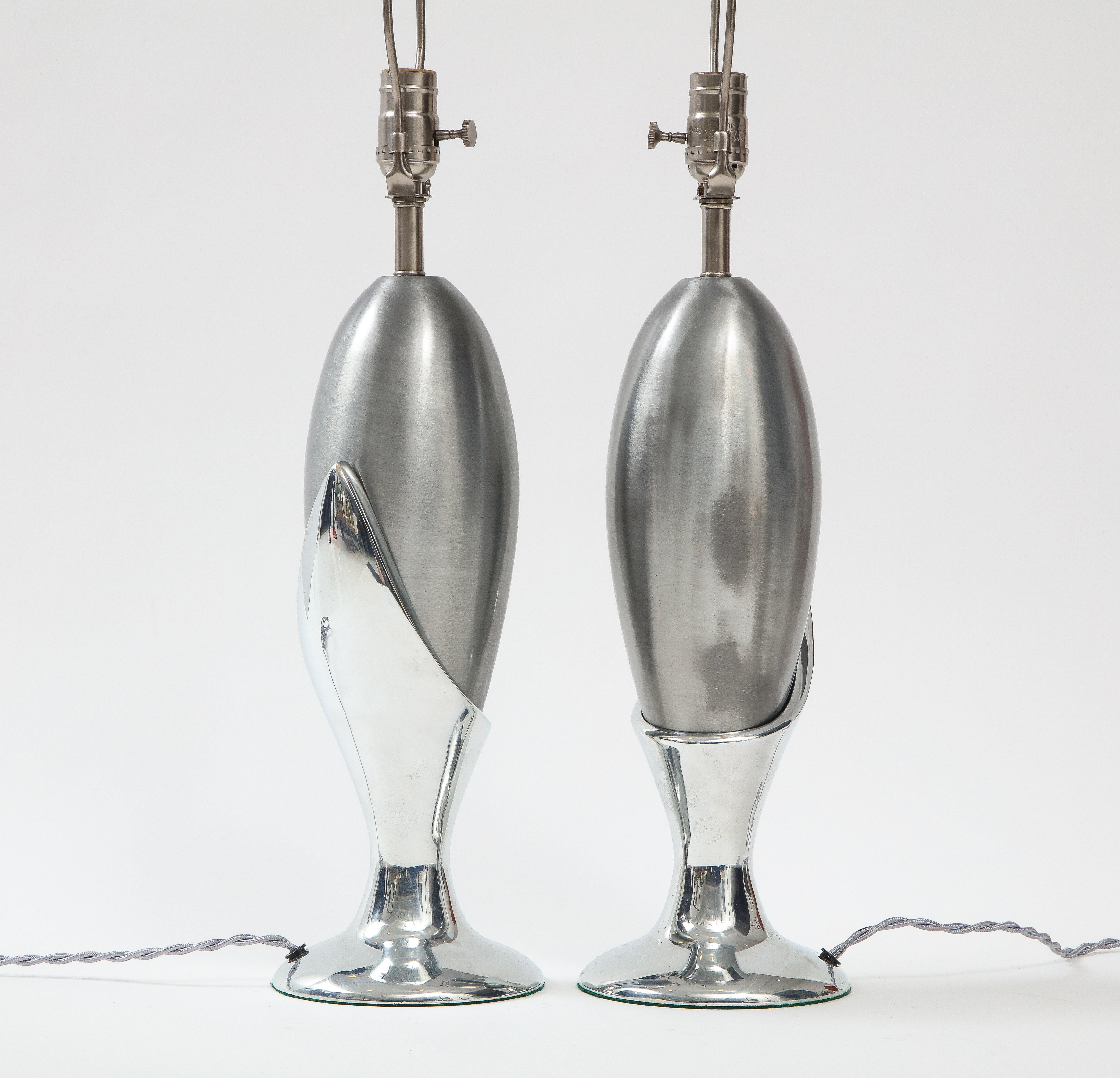 Pair of Modernist stylized flower/tree bud lamps featuring matte finished nickel buds resting in polished nickel base. Rewired with silver twist cord, 100W max bulbs. A rare, seldom seen design.