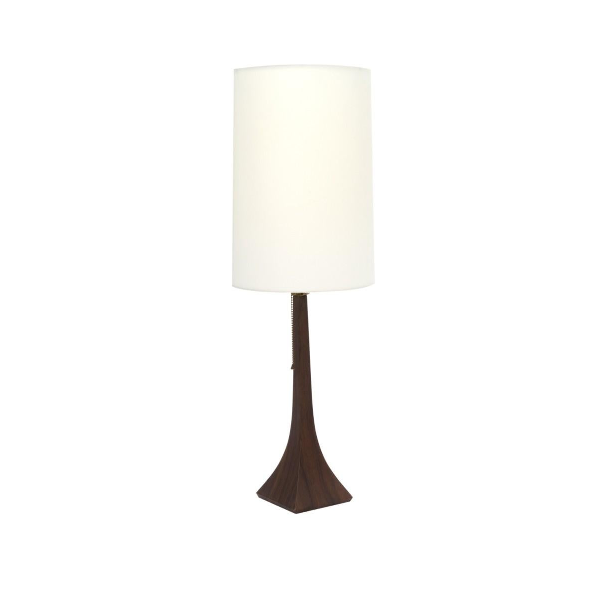 A sleek table lamp by Laurel, USA, circa 1960.

Includes tall drum paper shade.

Dimensions with shade:17