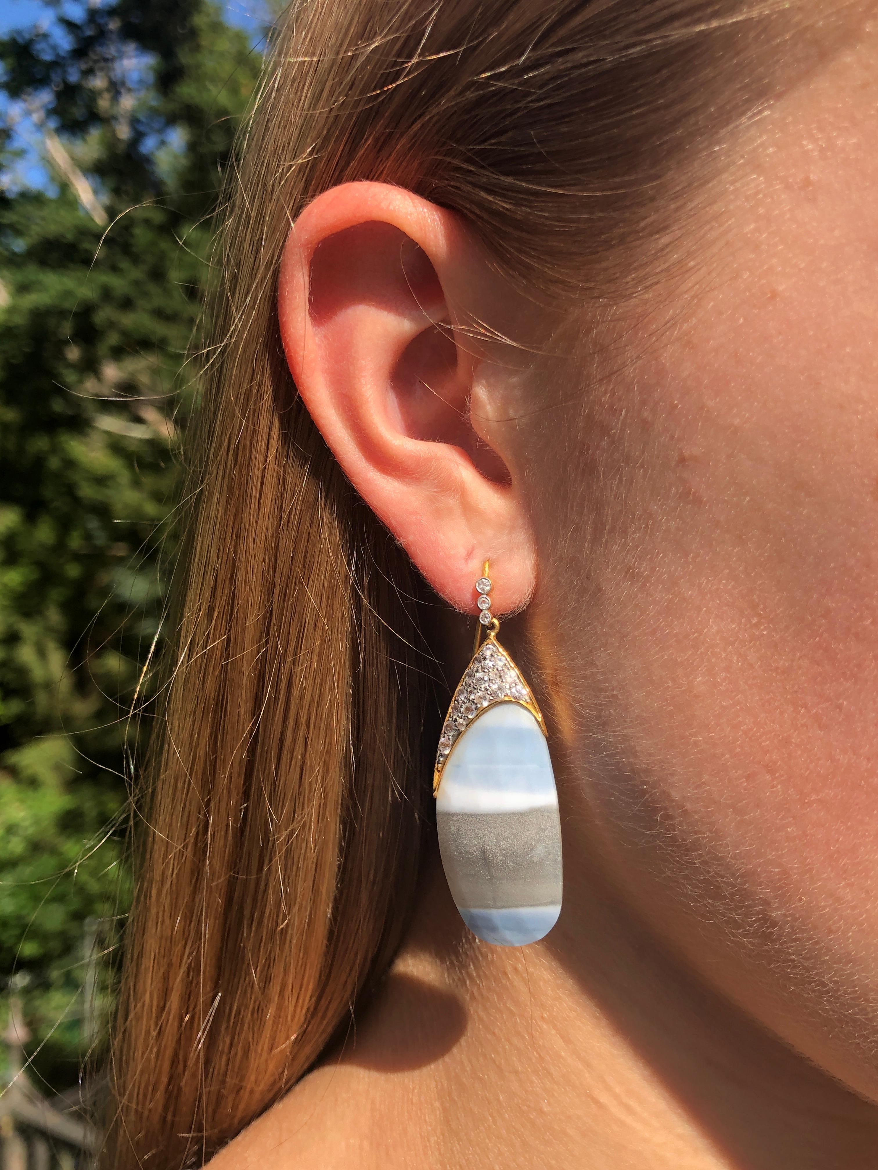 These 18kt Gold unique opaque striped African opals are set in matte 18kt Gold, which has been encrusted in faceted white Sapphires. Incredibly lightweight for their size, these are a great statement earring that won't hurt your ears.  Ships