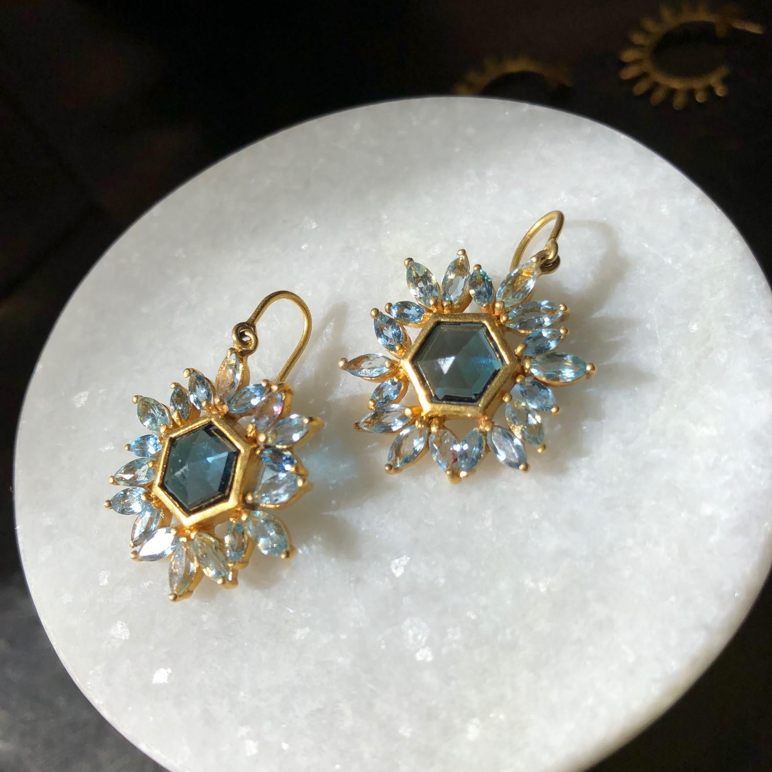 Lauren Harper London Blue Topaz Hexagon center stone, surrounded by faceted marquis Aquamarine set in 18kt yellow Gold.  Earrings are lightweight and hang on earwire in 18kt Gold.  Ships directly from original designer, Lauren Harper, in beautiful