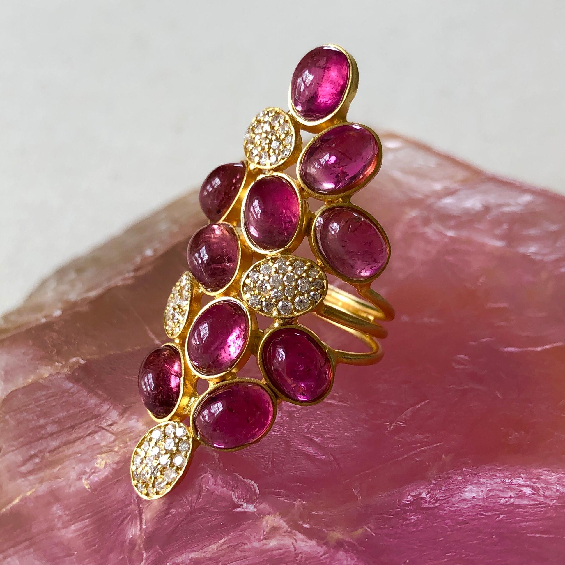 11.51ct Pink Tourmaline and .49cts Diamond stunning cocktail ring.  Ring sits comfortably low on the finger, and has a beautiful 18kt Gold matte finish. Pink Tourmaline is vibrant and natural, and cut in oval cabachons.  Diamonds are set in a white