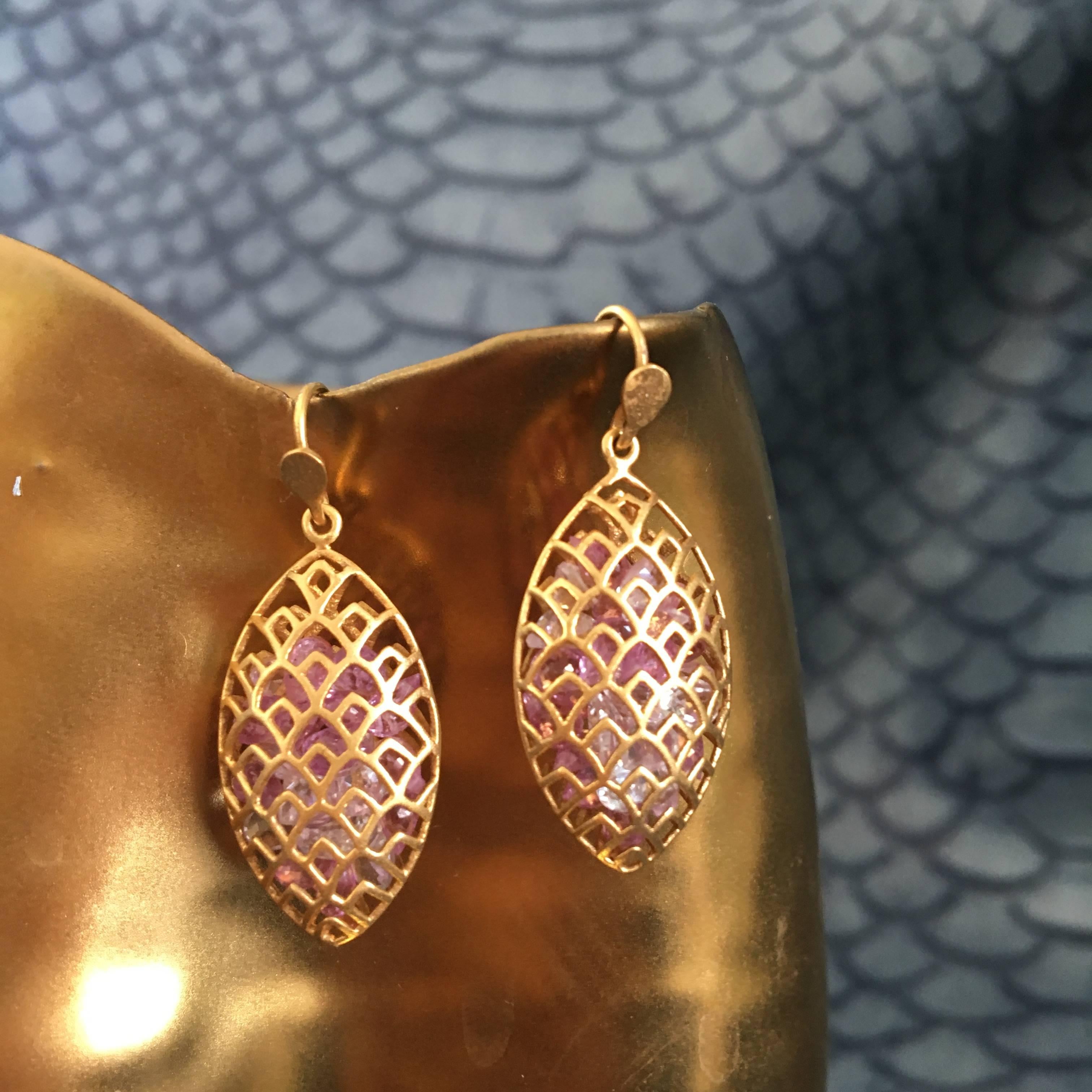 Loose pink sapphires float inside a beautiful 18kt Gold marquis shaped cage.  Finished in Lauren Harper's signature matte gold finish, these earrings are petite and perfect for all day wear, but special enough for a fabulous evening out. 