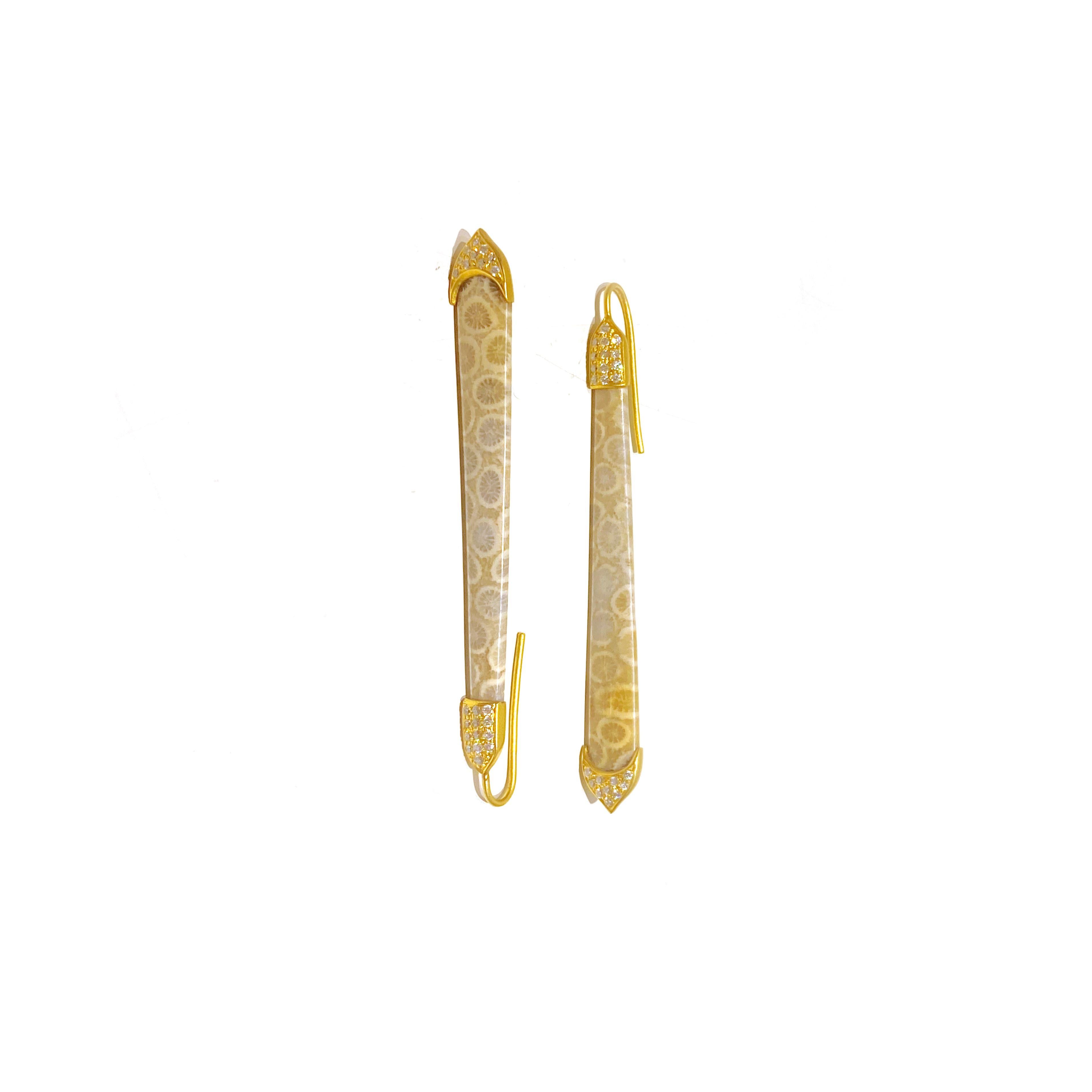 These earrings feature a unique design with fossilized corals, diamonds, and yellow gold. 

Details
Fossilized Corals 
Diamonds 0.53 ct. 
18K Yellow Gold
Length 2.65 inches 
