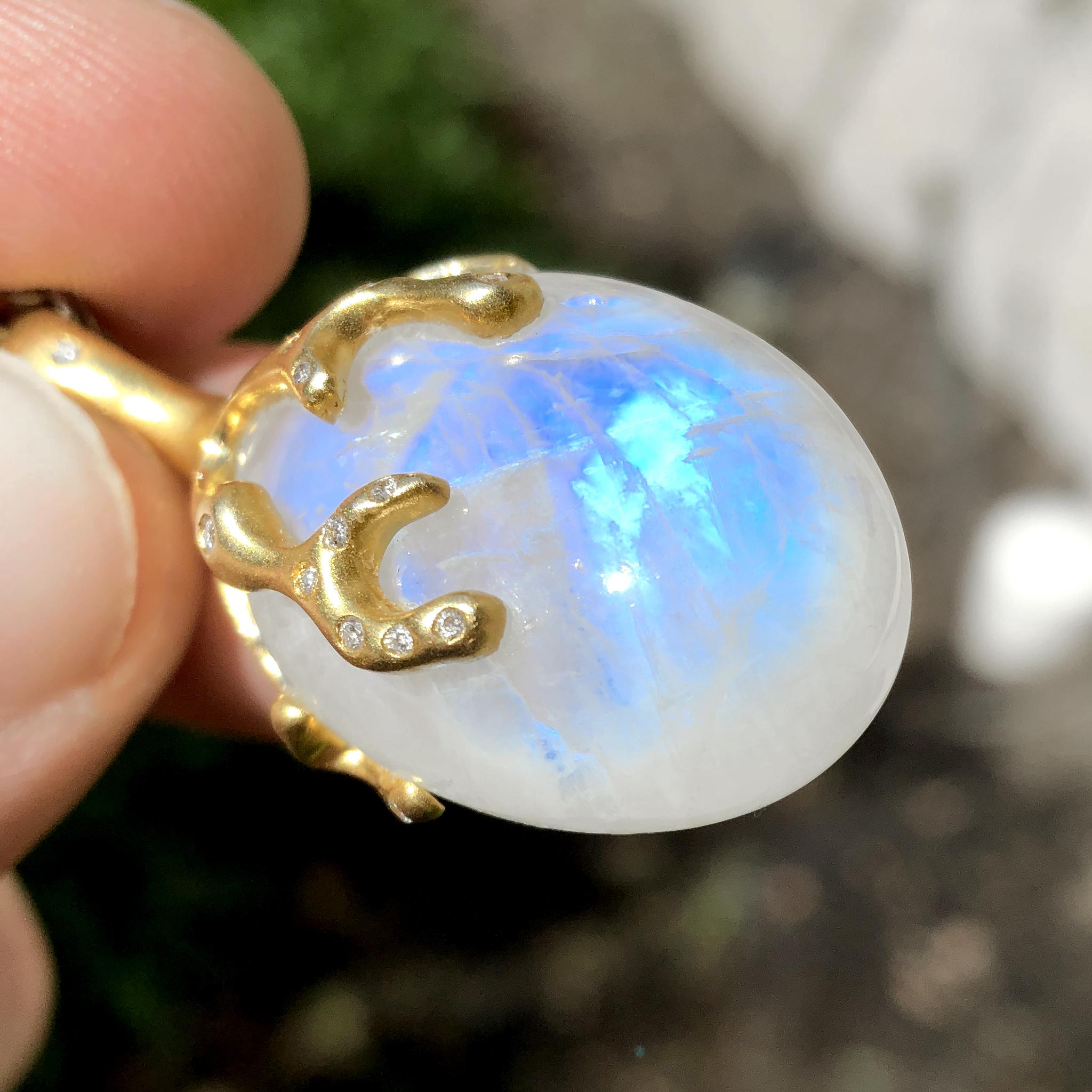 Long Drop Necklace handcrafted by award-winning jewelry designer Lauren Harper showcasing a spectacular large rainbow moonstone egg set with signature-finished 18k yellow gold vines around the entire gem that are inlaid with 0.56 total carats of