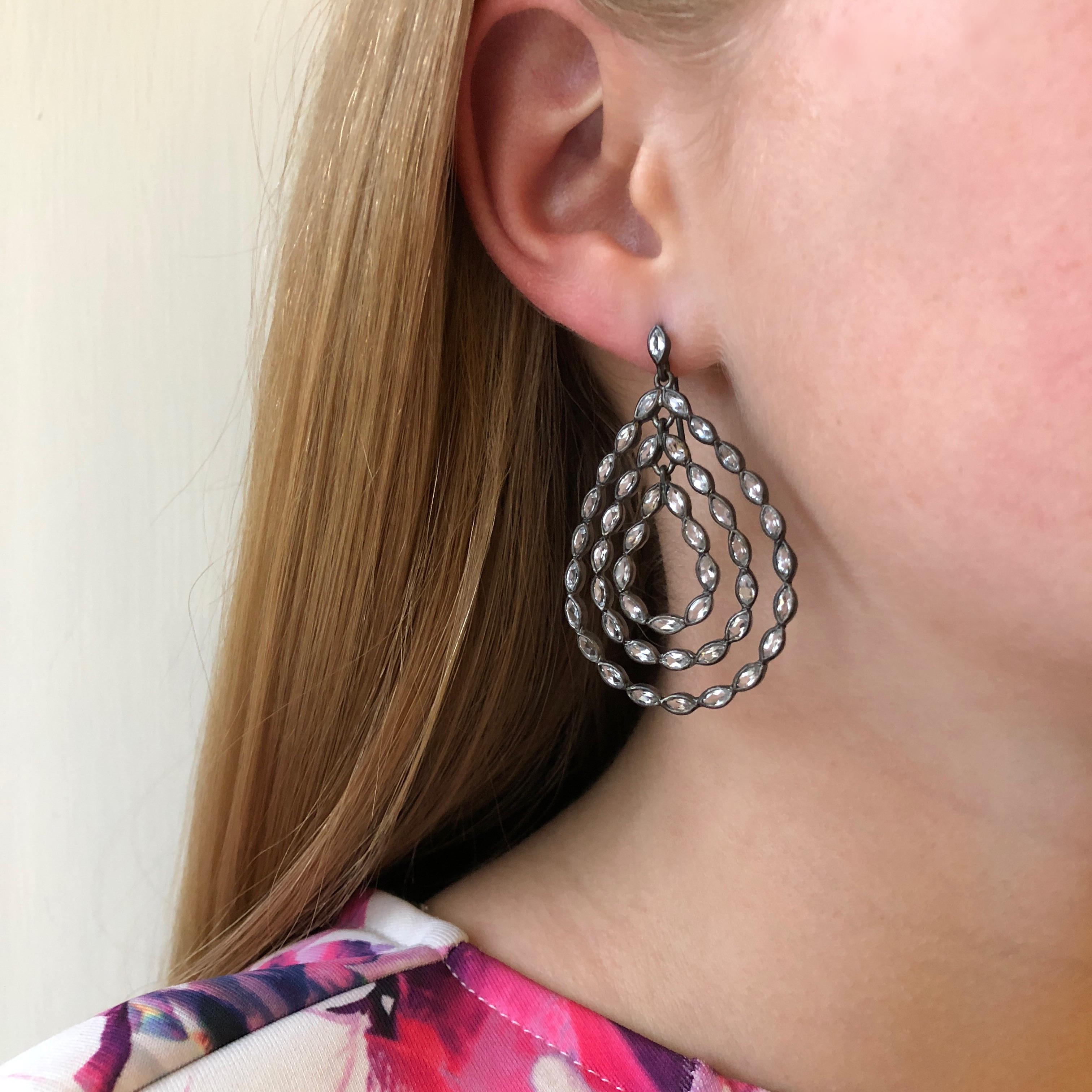 These Black Silver Earrings sparkle brightly with faceted White Topaz marquis shaped stones, in 3 beautiful pears that move inside one another.  These earrings are sterling silver finished with Black Rhodium, so they will keep their black color