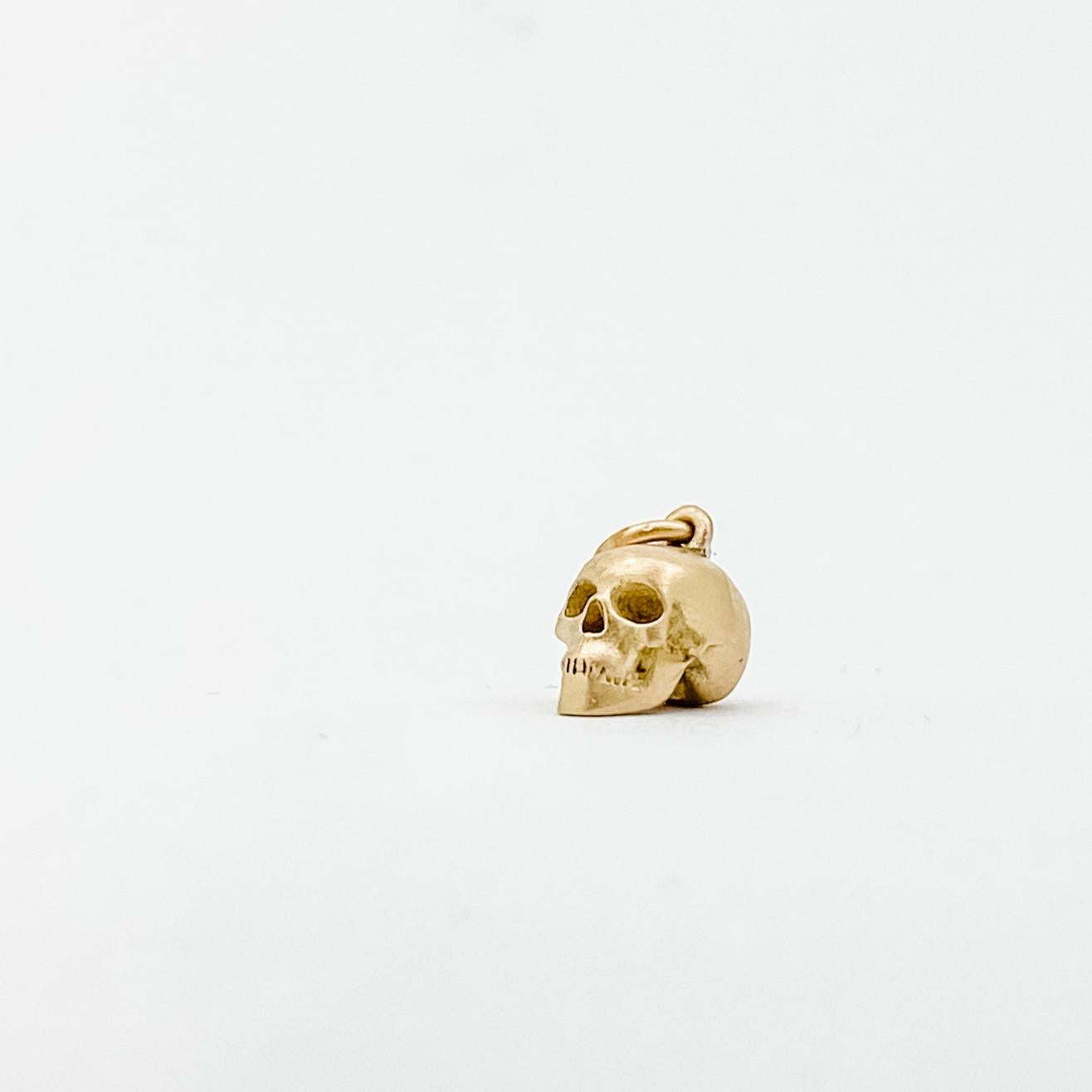 Women's or Men's Lauren Newton Gold Matter Skull Charm in 18k yellow gold For Sale