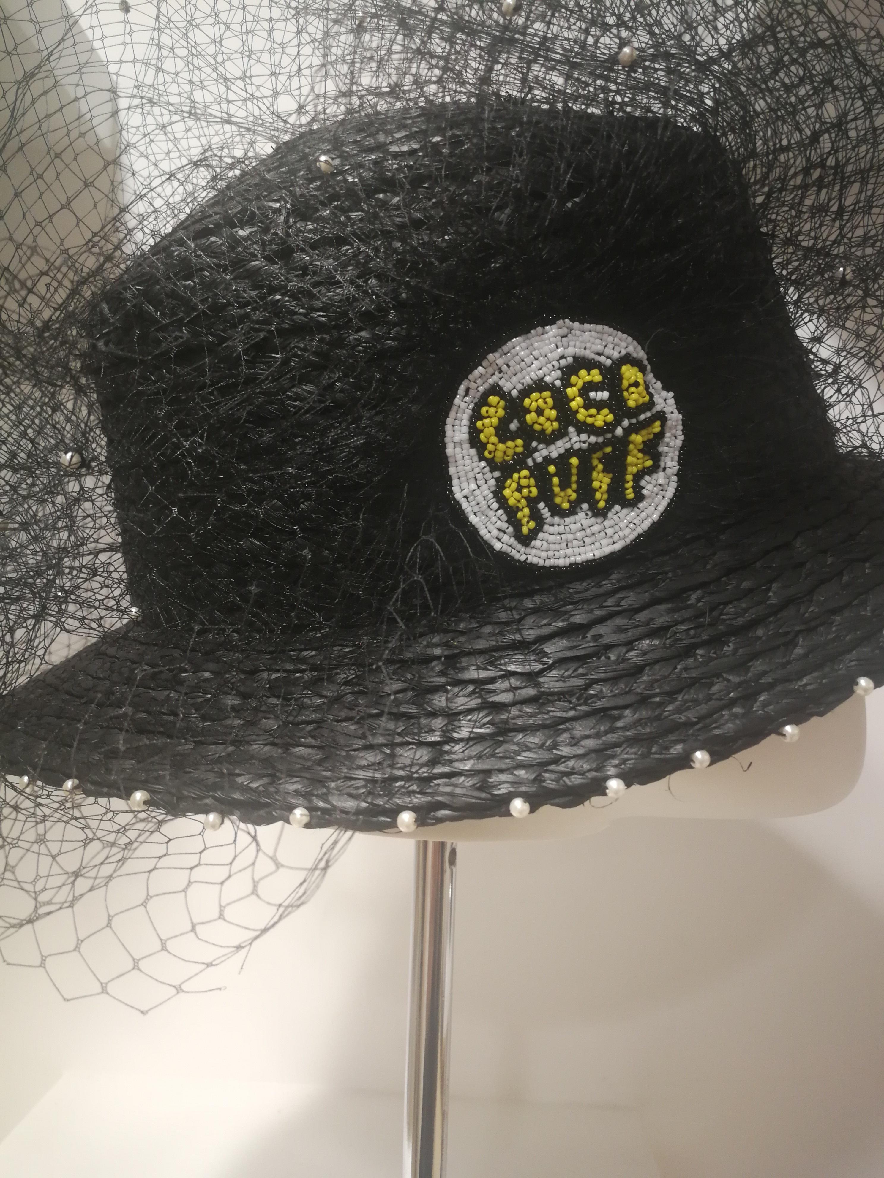Laurence and Chico Black Hat 
embellished with white pearls and pattern 
