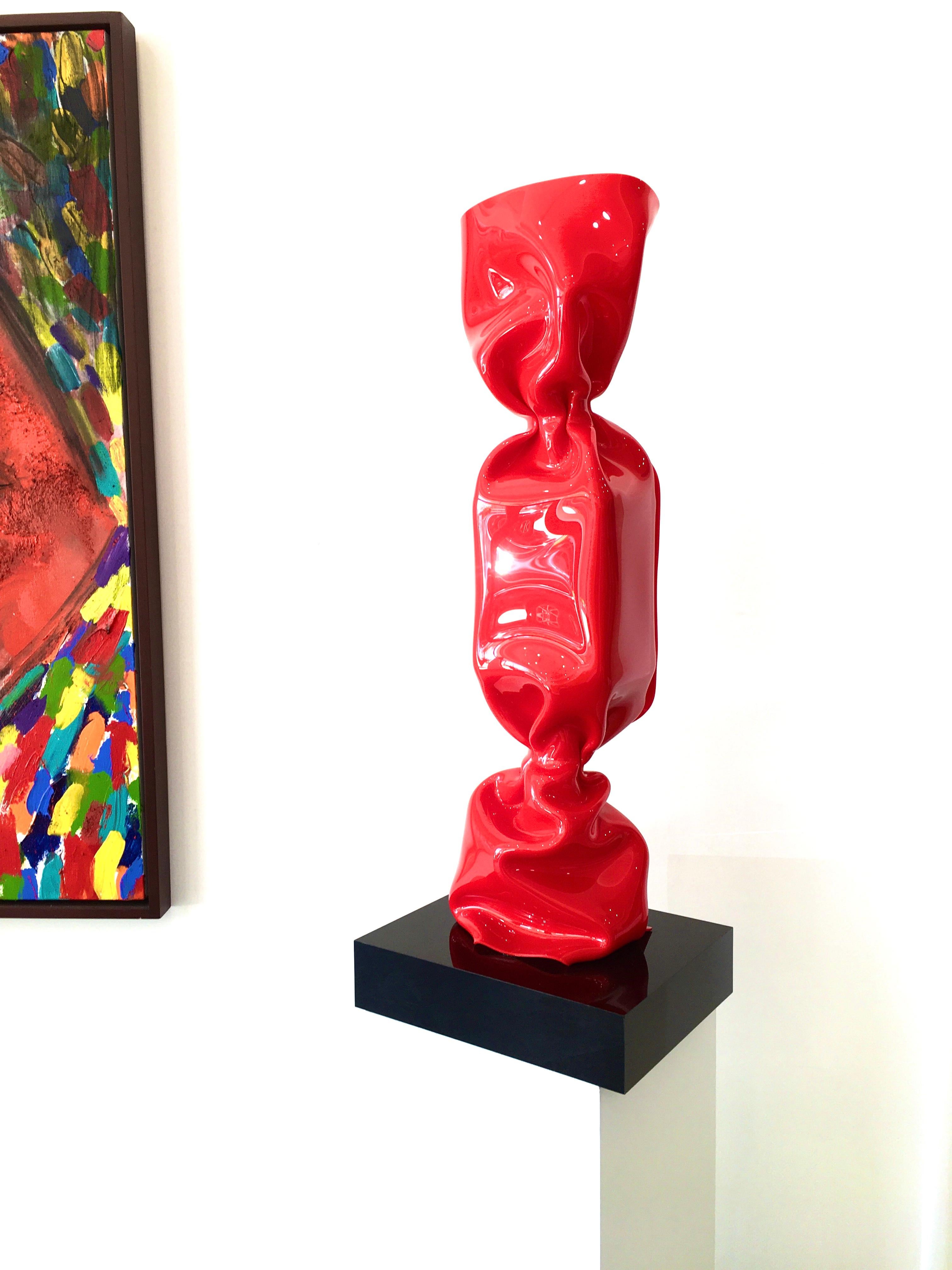 Laurence Jenkell Figurative Sculpture - Wrapping Red Candy