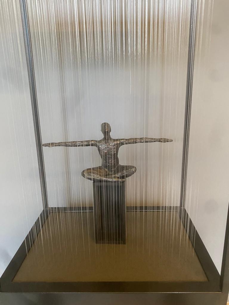 Acrylic thread, bronze figure, steel base