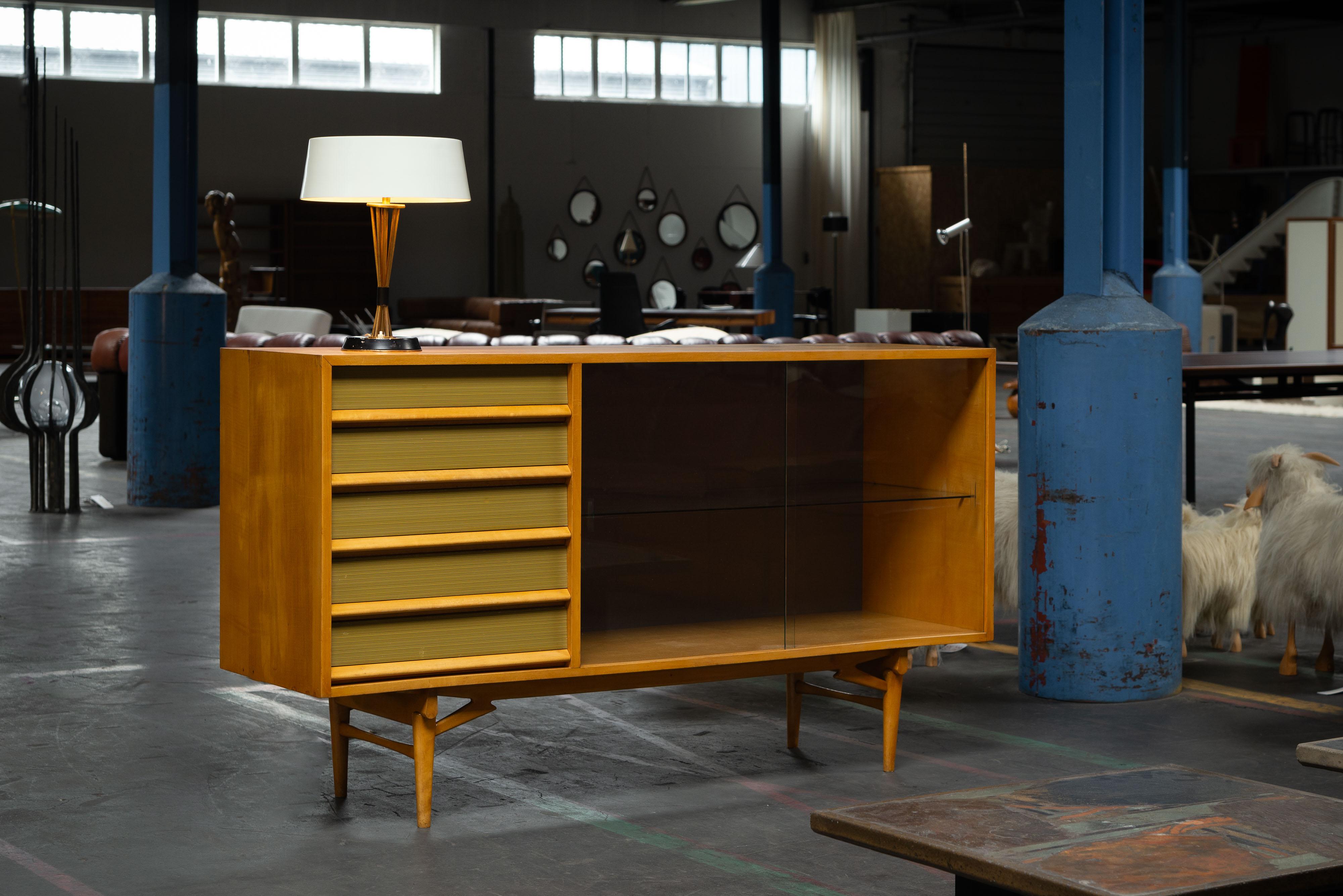 One of a kind credenza designed and made by Laurens Bisscheroux which is coming from an interior designed for his aunt in 1956. This design has beautiful French or Italian influenced details, especially in the legs. These have this sculptural shape