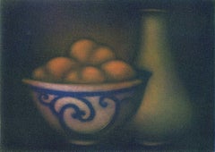 Blue and White Bowl of Fruit next to Vase