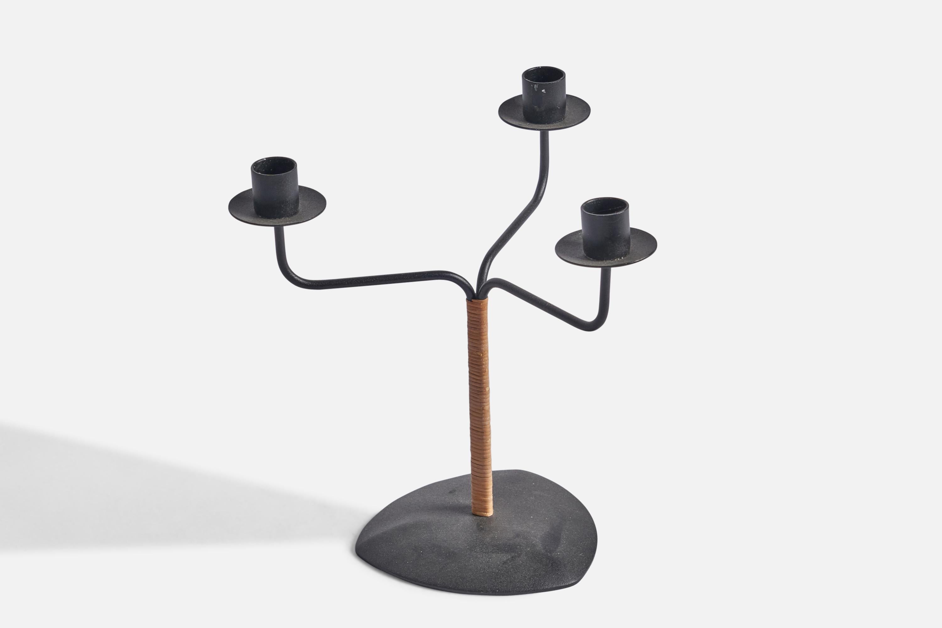 A black-lacquered metal and rattan candelabra designed and produced by Laurids Lønborg, Denmark, 1950s.

Holds 0.75” candles