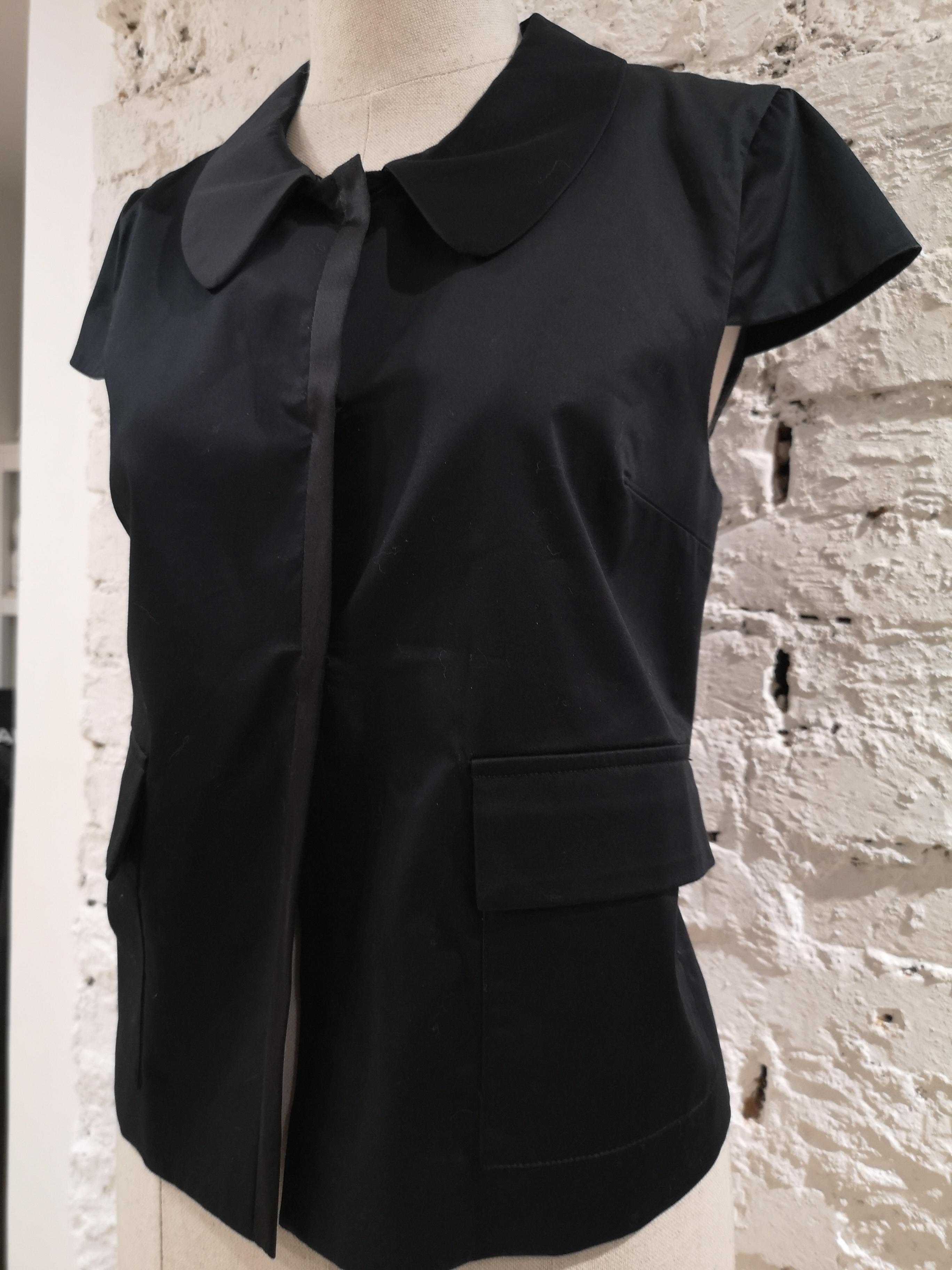 L'Autre Chose black shirt - sleeveless jacket
totally made of cotton in size 44