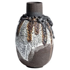 Lava glaze vase in black and white with volcanic stone and iron filings