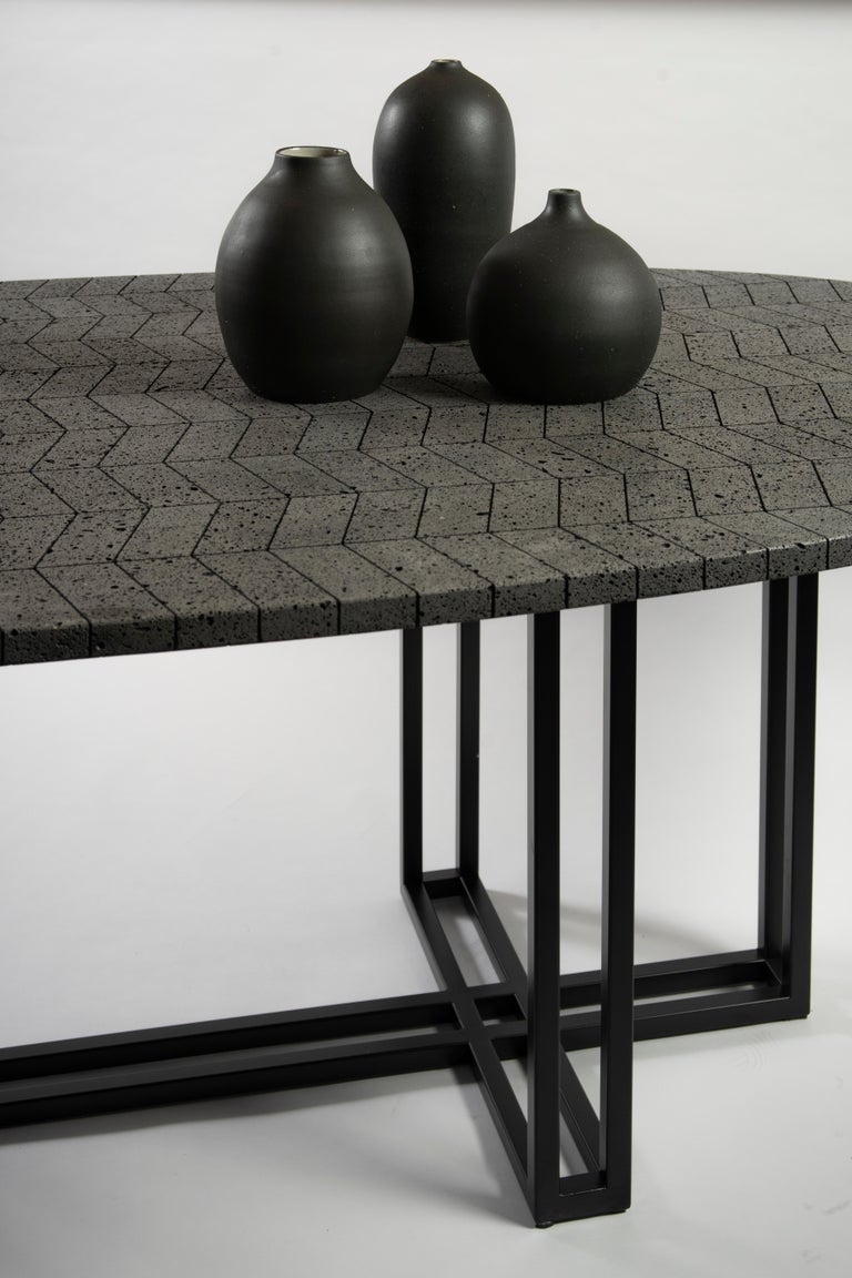 Lava Oval Table, Volcanic Rock and Black Stainless Steel at 1stDibs