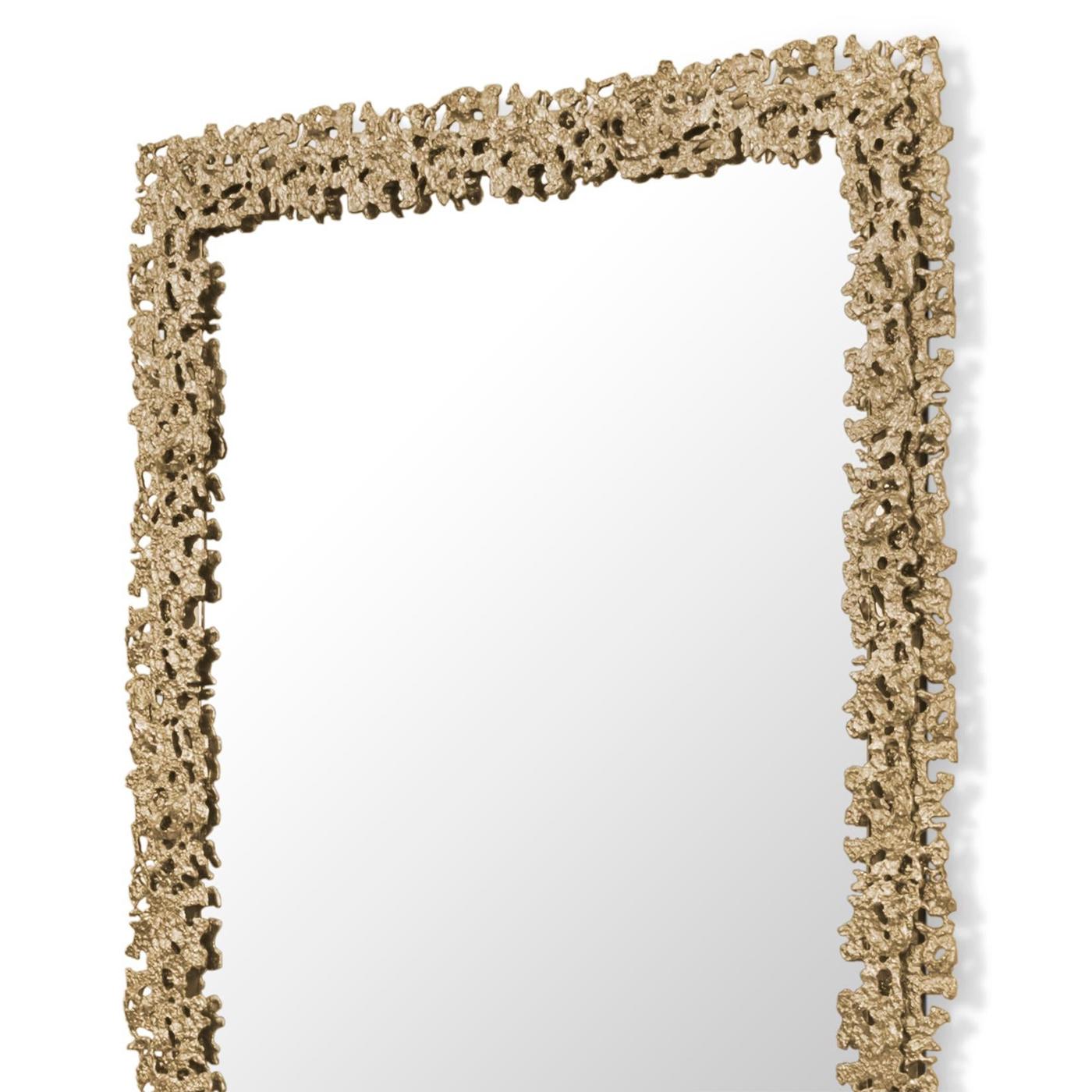 Mirror Lava rectangular with casted solid
brass frame in matte finish and with clear 
glass mirror.