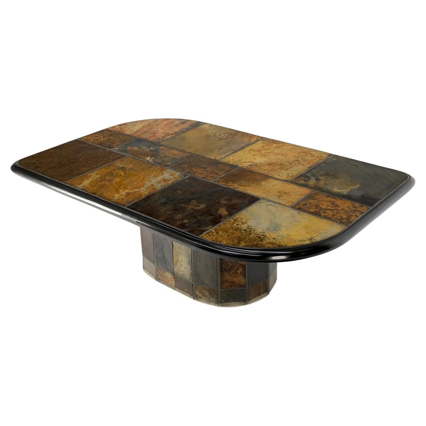 Table basse en forme de pichet de guitare en pierre de lave avec plateau en carreaux multicolores et base à piédestal