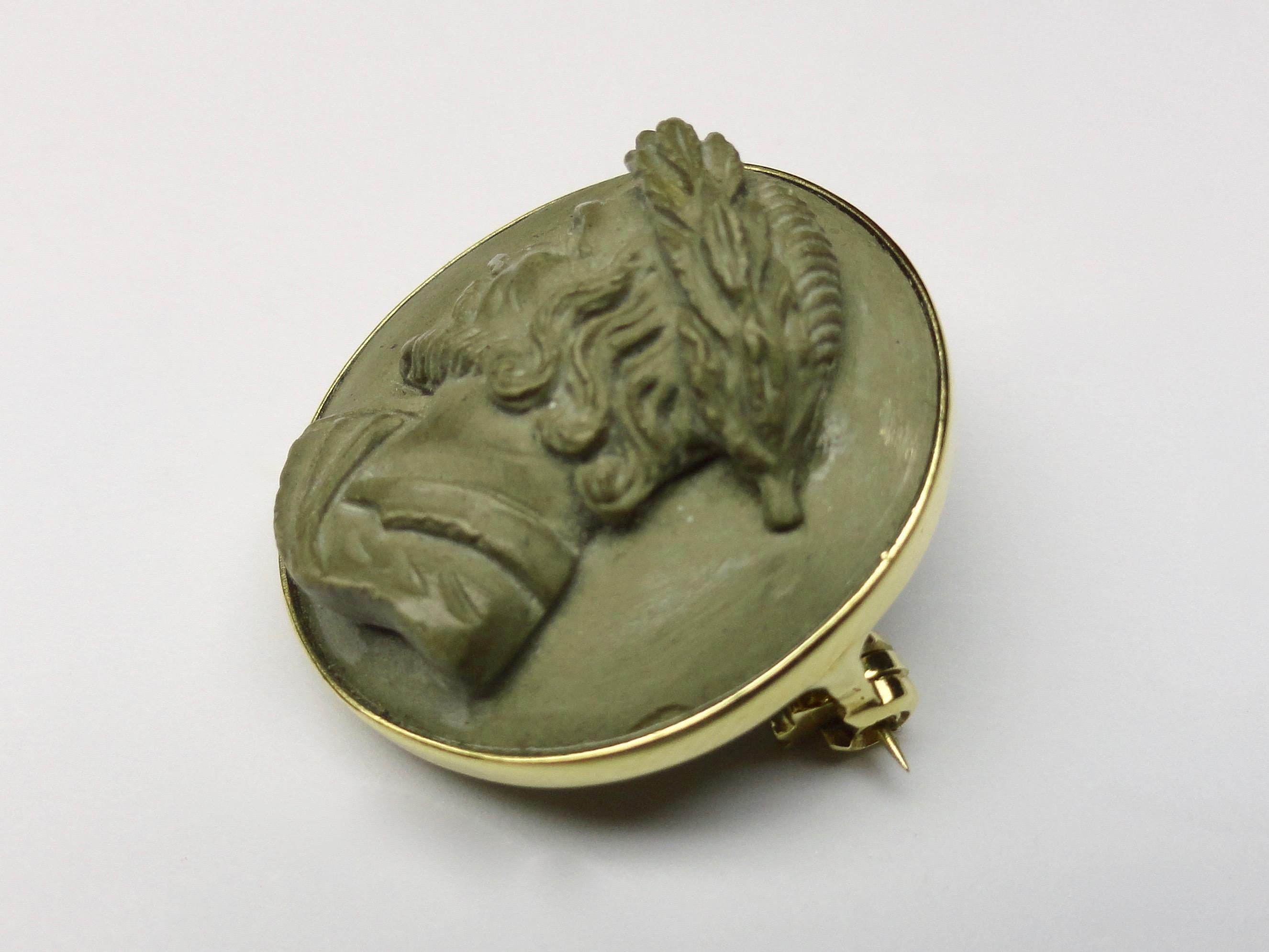 Lava stone cameo brooch set in 18ct gold For Sale 1