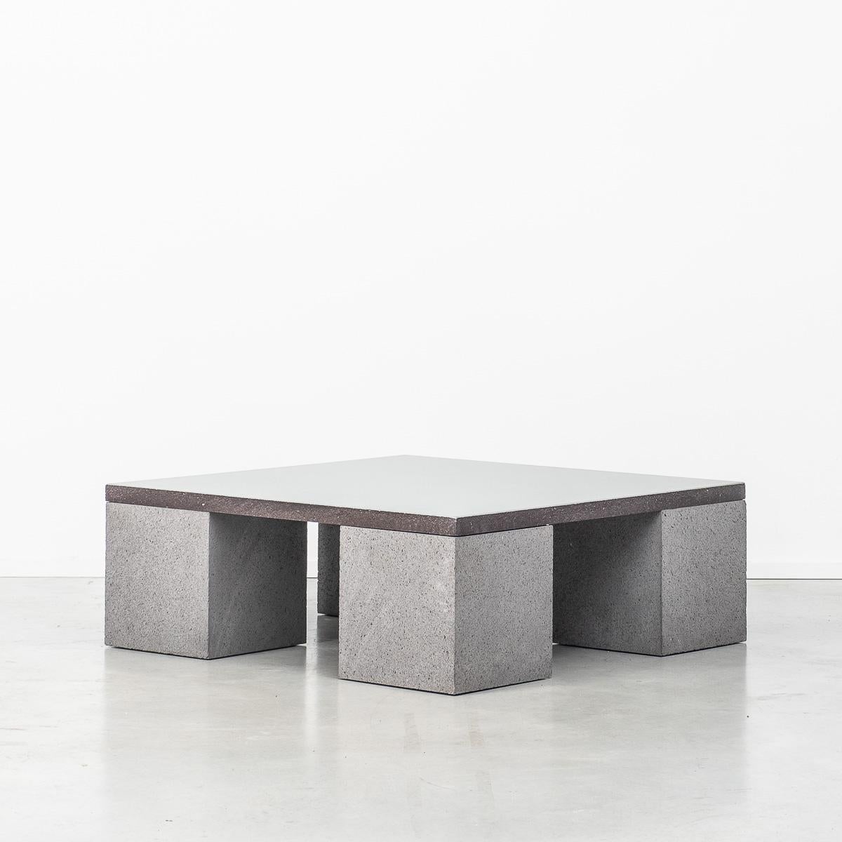 Rare coffee table by British designer Faye Toogood. Made from green glazed ceramic and grey lava stone. Pleasing cuboid form legs. Low profile for modern living rooms.