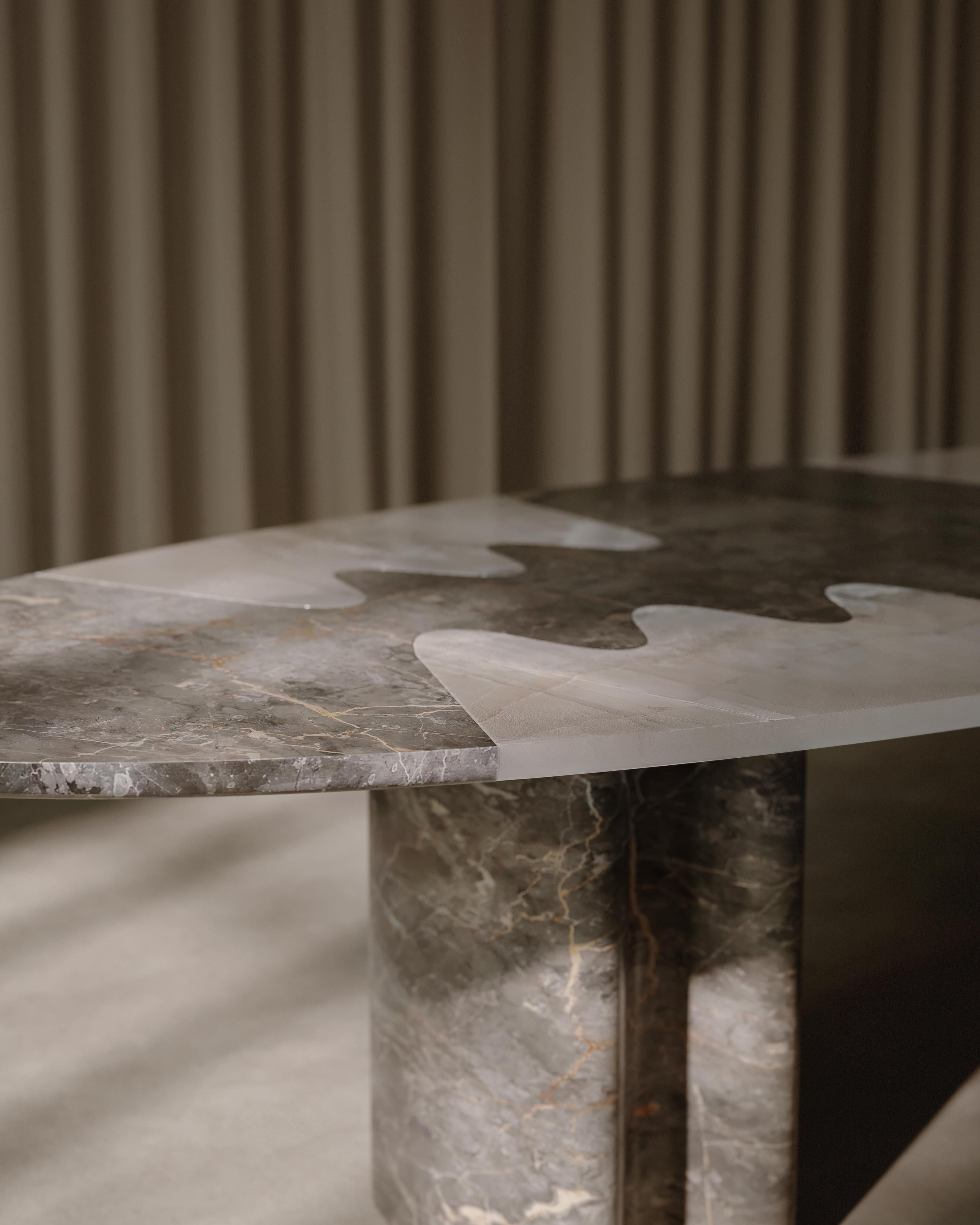 Transform your dining space into a sculptural masterpiece with the extraordinary Lavanche Dining Table, where monumental marble craftsmanship meets contemporary design innovation in breath-taking harmony.

Our Lavanche Table transcends traditional