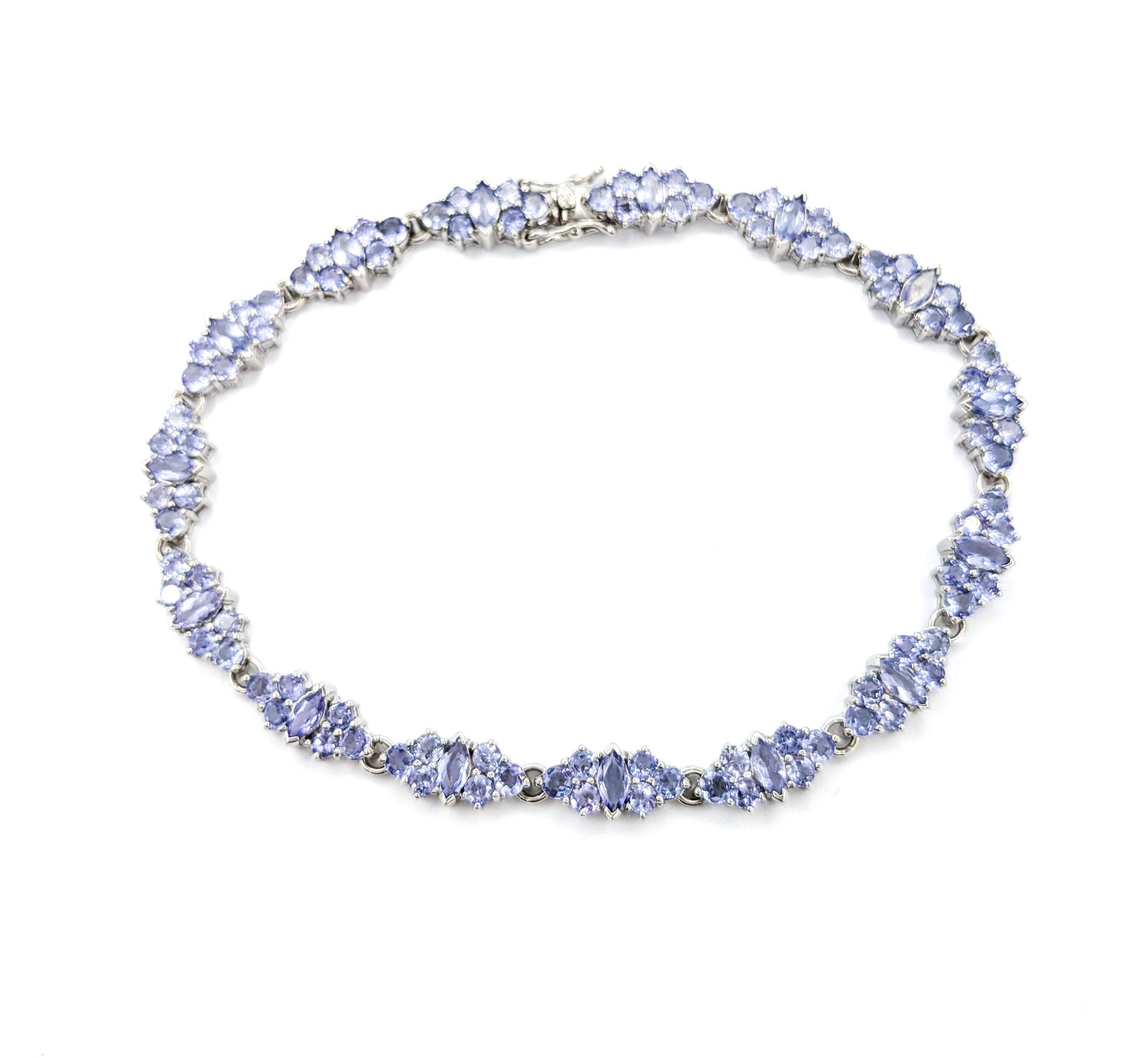 Lavender 8.5ctw Tanzanite Tennis Bracelet in White Gold

Introducing this beautiful gemstone bracelet, expertly crafted in 14k white gold. This exquisite bracelet showcases 8.5 carats of mesmerizing tanzanites, known for their enchanting blue-violet