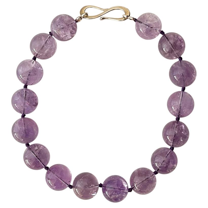 Natural amethyst hand knotted bead necklace with Gold on Silver clasp 20