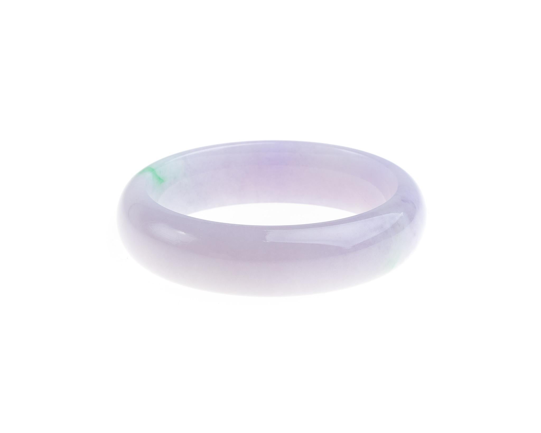 This all natural, untreated lavender jadeite jade bangle with hint of apple green and bangle size of 54.4mm. This bangle's inner diameter measures 2.14 inches (54.4mm) and outer diameter measures 2.74 inches (69.6mm) with bangle width of 0.61 inches