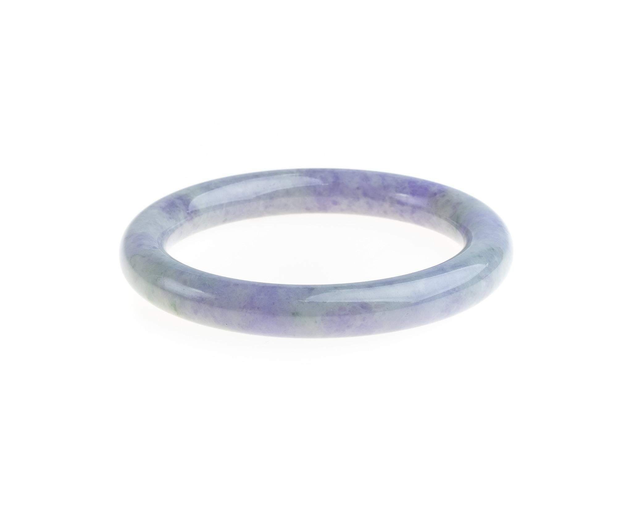 This all natural, untreated lavender and gray carved jadeite jade bangle in size 56.3mm.  
This bangle's inner diameter measures 2.22 inches (56.4mm) and outer diameter measures 2.97 inches (75.6mm) with bangle width of 0.37 inches (9.6mm). 