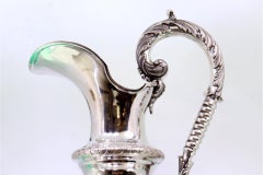 Lavender and silver ewer with guilloche, friezes, and mythological handle