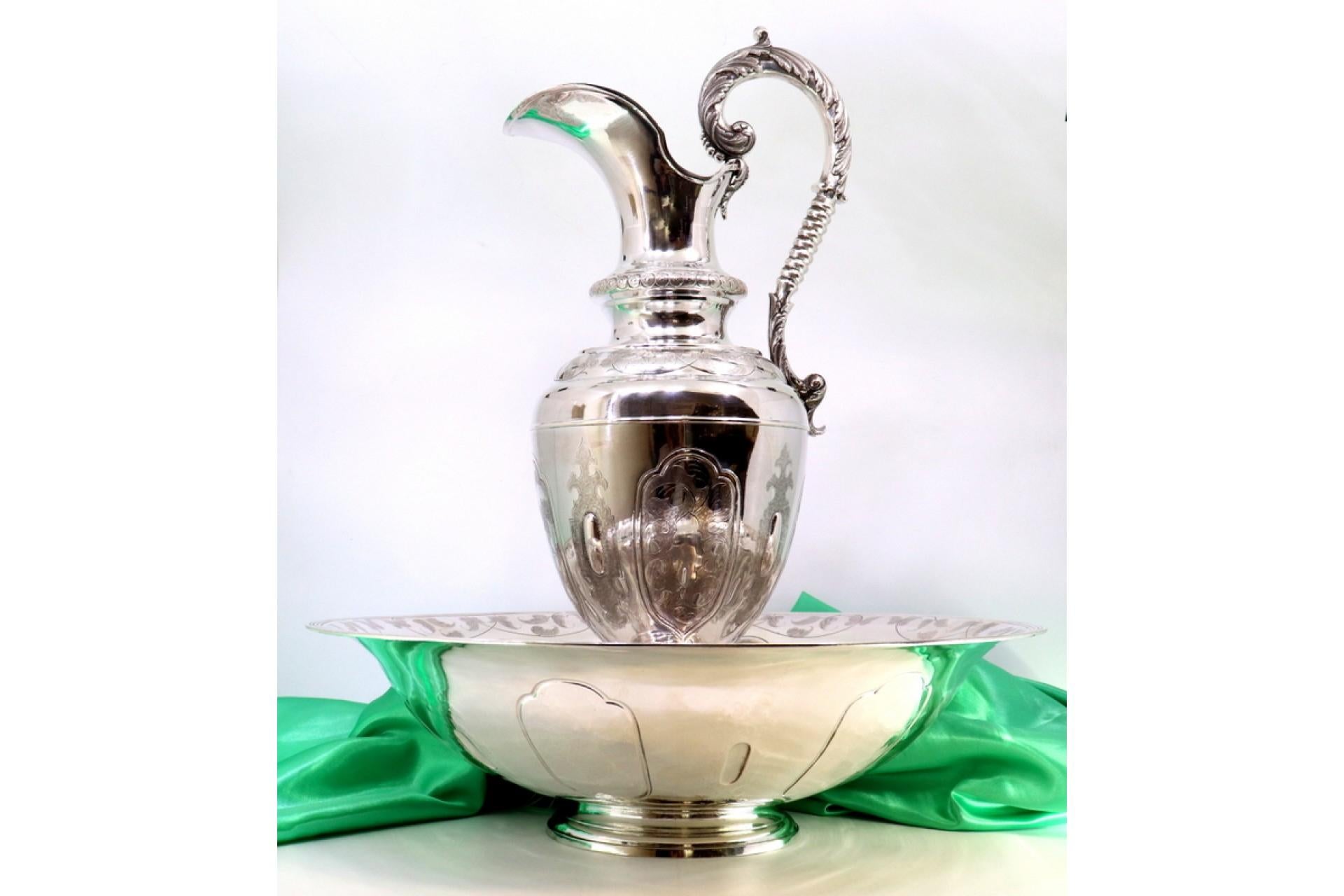 Lavender and silver ewer with guilloche, friezes, and mythological handle