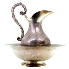 Lavender and silver gum with garland engravings and acanthus-leaf handle