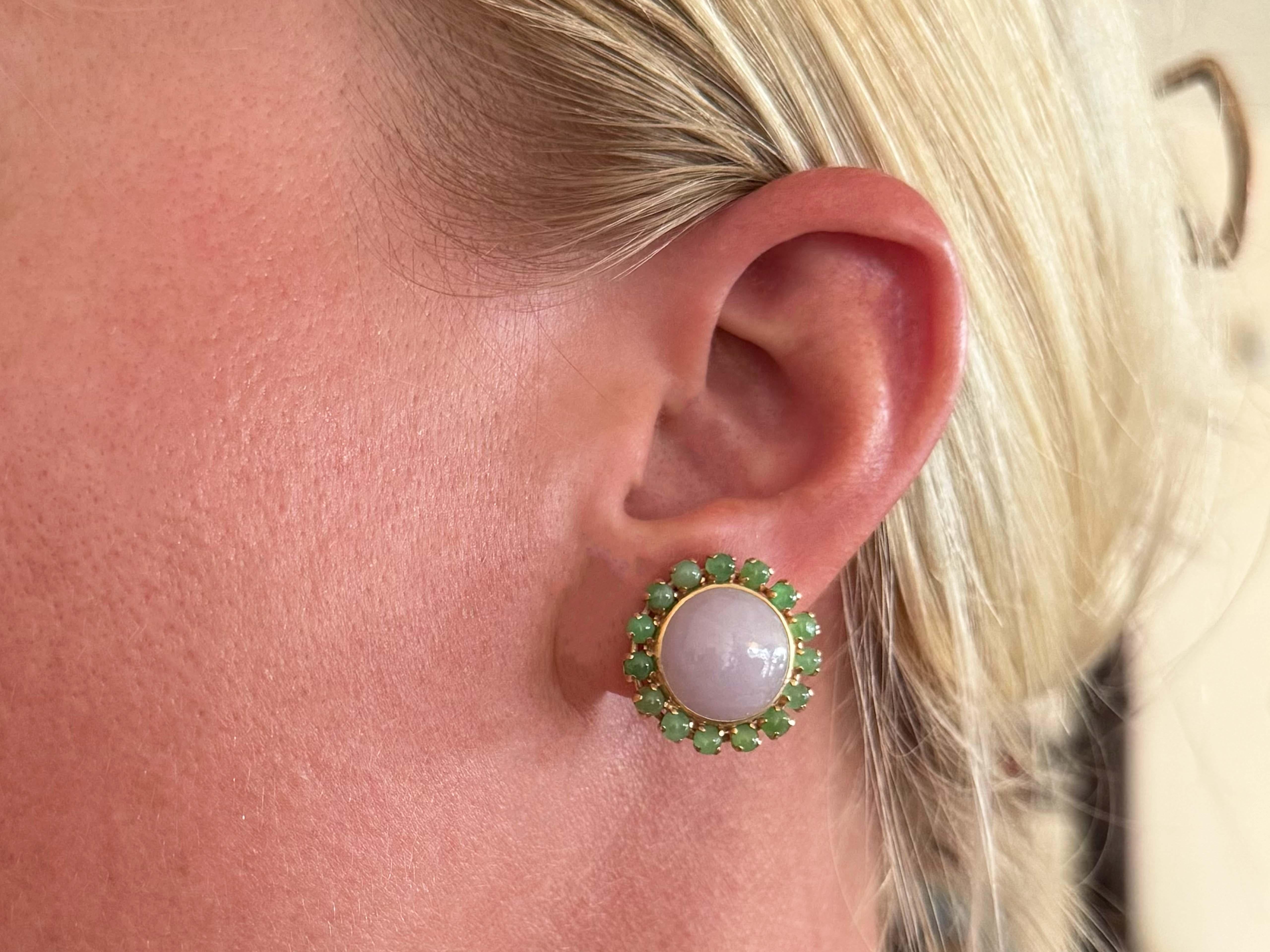 Earrings Specifications:

Metal: 14K Yellow Gold

Total Weight: 13.4 Grams

Gemstone: Lavender and Green Jade

Lavender Jade Diameter: ~13.0 mm x 13.2 mm

Earring Diameter: 20.0 mm x 20.0 mm
​
Green Jade Diameter​: ~2.7 mm

Stamped: