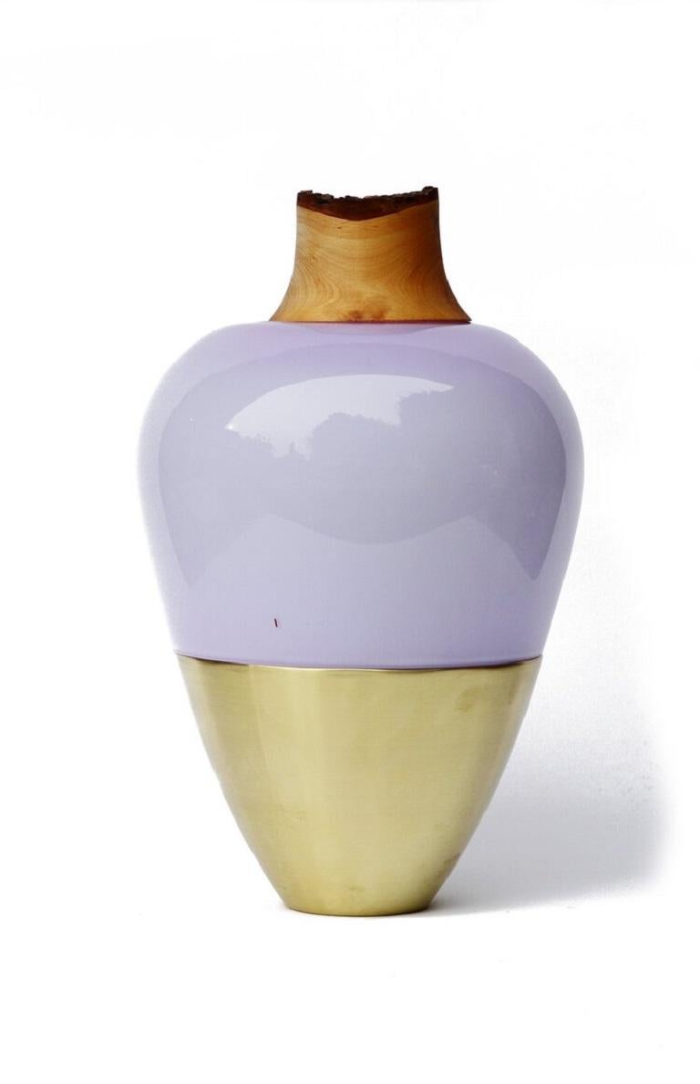 Lavender India Vessel I, Pia Wüstenberg
Dimensions: D 20 x H 38
Materials: glass, wood, metal
Available in other metal: brass, copper, brass patina, copper patina

Handmade in Europe, by individual craftsmen: handblown glass (Czech Republic),