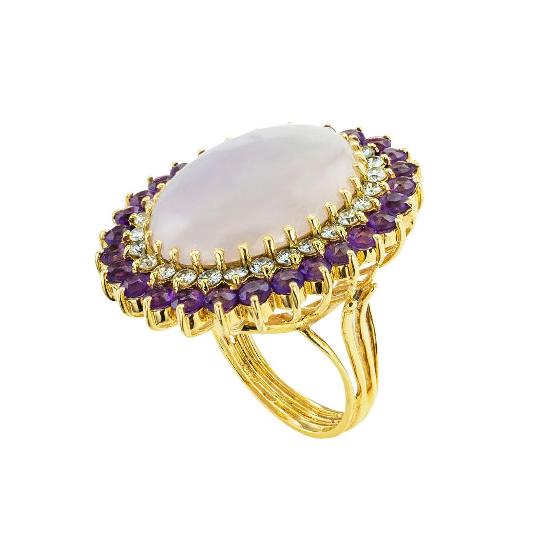 Lavender jade amethyst diamond and gold cocktail ring circa 1980. *

ABOUT THIS ITEM:  #A8075 Scroll down for specifications.  While the color scheme of this design is dramatic, it is equally pleasing to the eye, and despite its vintage, it looks
