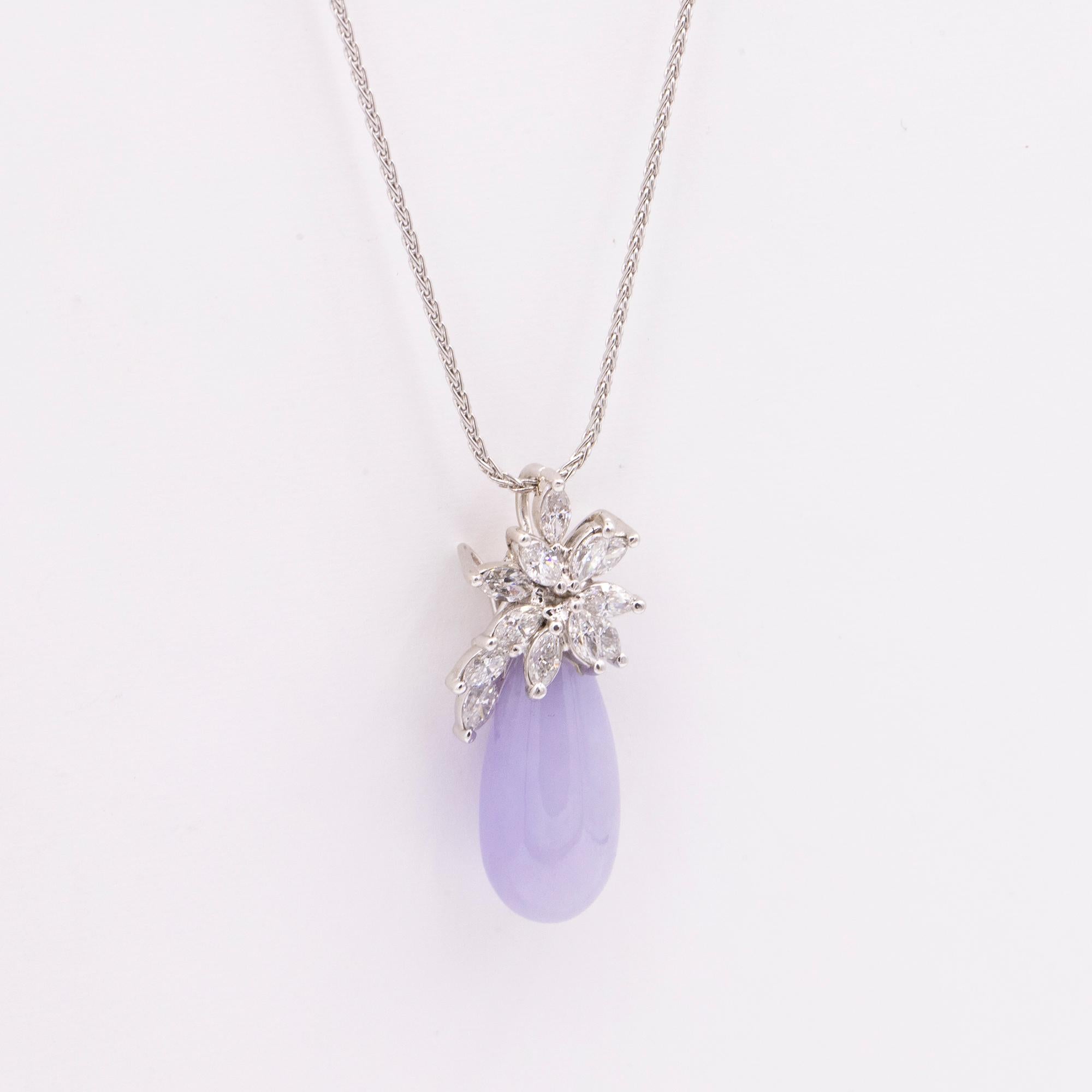 18kt White Gold Lavender Jade & Diamond Pin/Pendant. The Jade is a Briolette cut with 12 Marquise cut diamonds weighing approximately .75 carats in total weight. The diamonds are H in color & VS-SI1 in clarity.