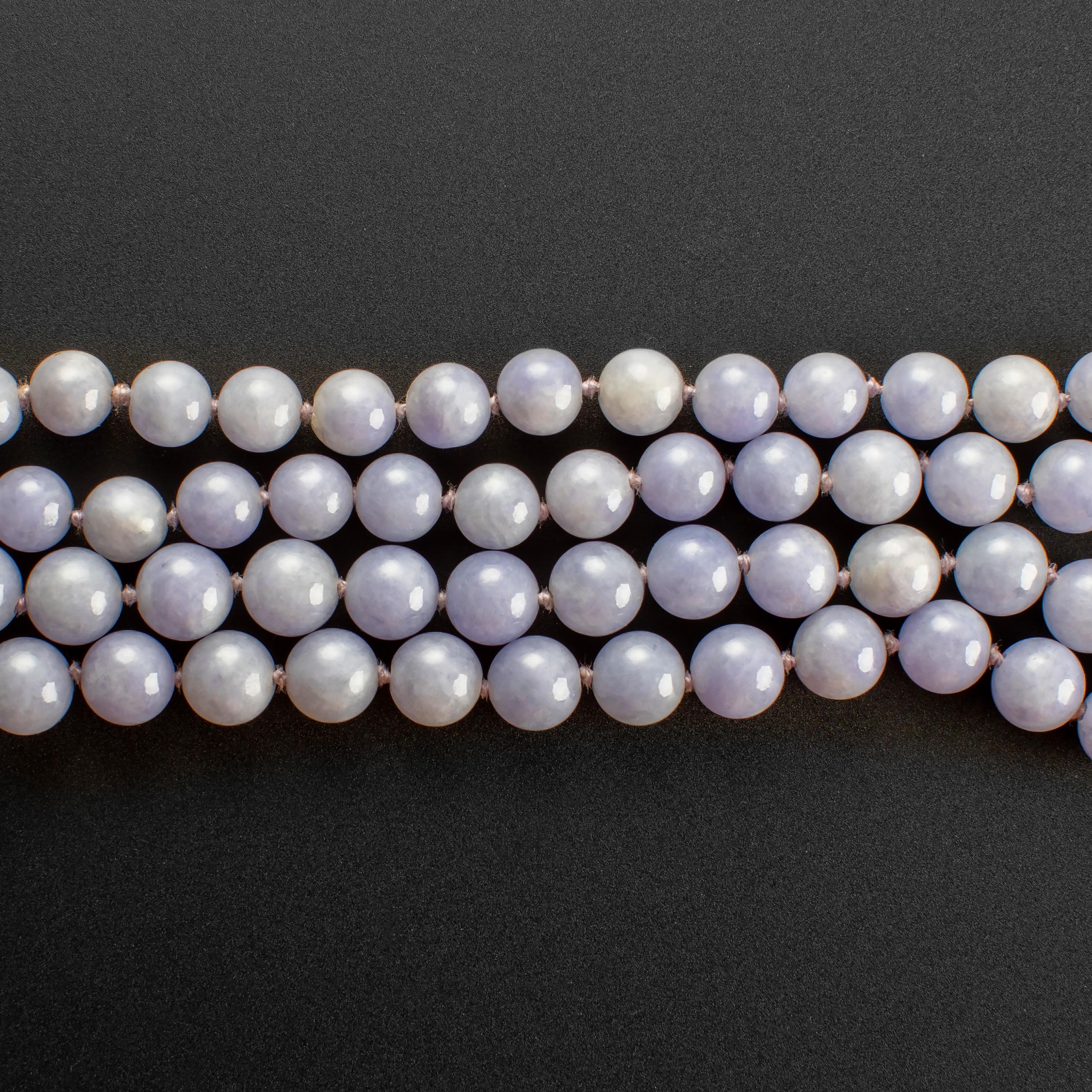 This gorgeous and rare necklace consists of 76 evenly-toned, translucent beads of the most ethereal lavender jade. Measuring 28
