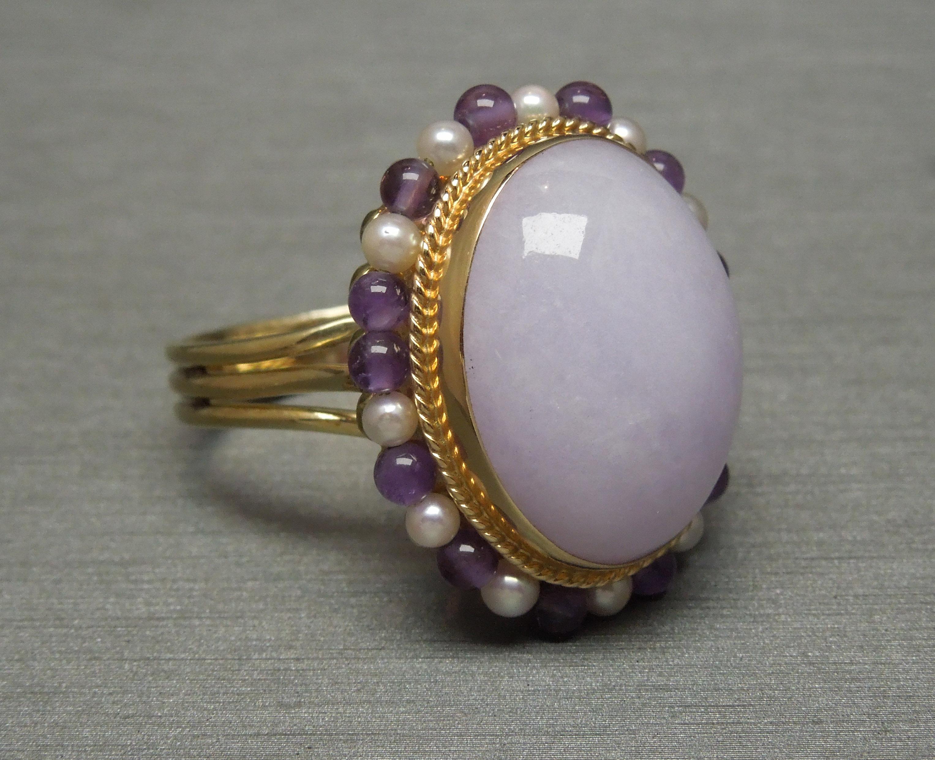 In a Hand-Fabricated British inspired mounting, with 1 central Bezel set Oval piece of Natural Lavender Jade. The most calming, tranquil shade of Jade. Known worldwide for its healing properties, securely [bezel] set in a prong-less setting. 
Found