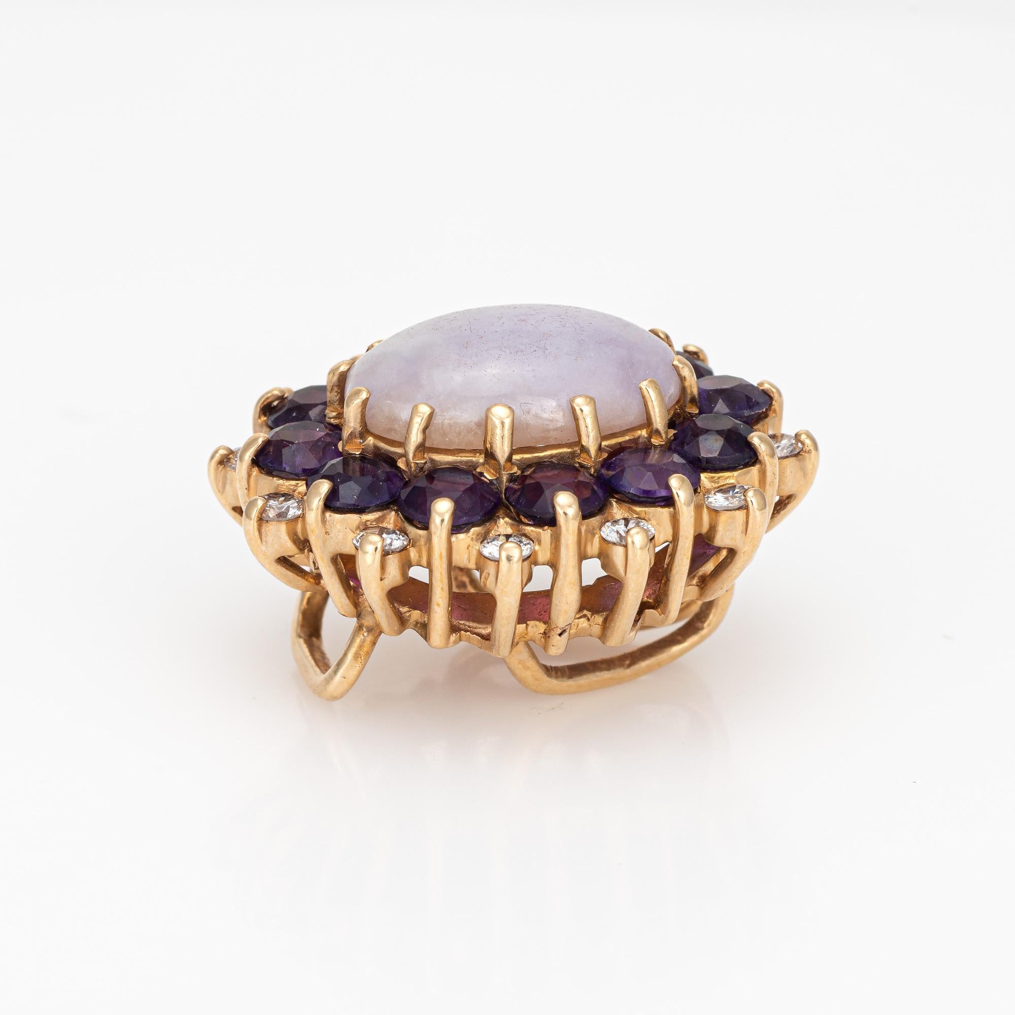 Finely detailed vintage lavender jade, amethyst & diamonds pendant crafted in 14 karat yellow gold (circa 1970s to 1980s). 

Twelve diamonds total an estimated 0.48 carats (estimated at I-J color and SI2-I2 clarity). Amethysts total an estimated