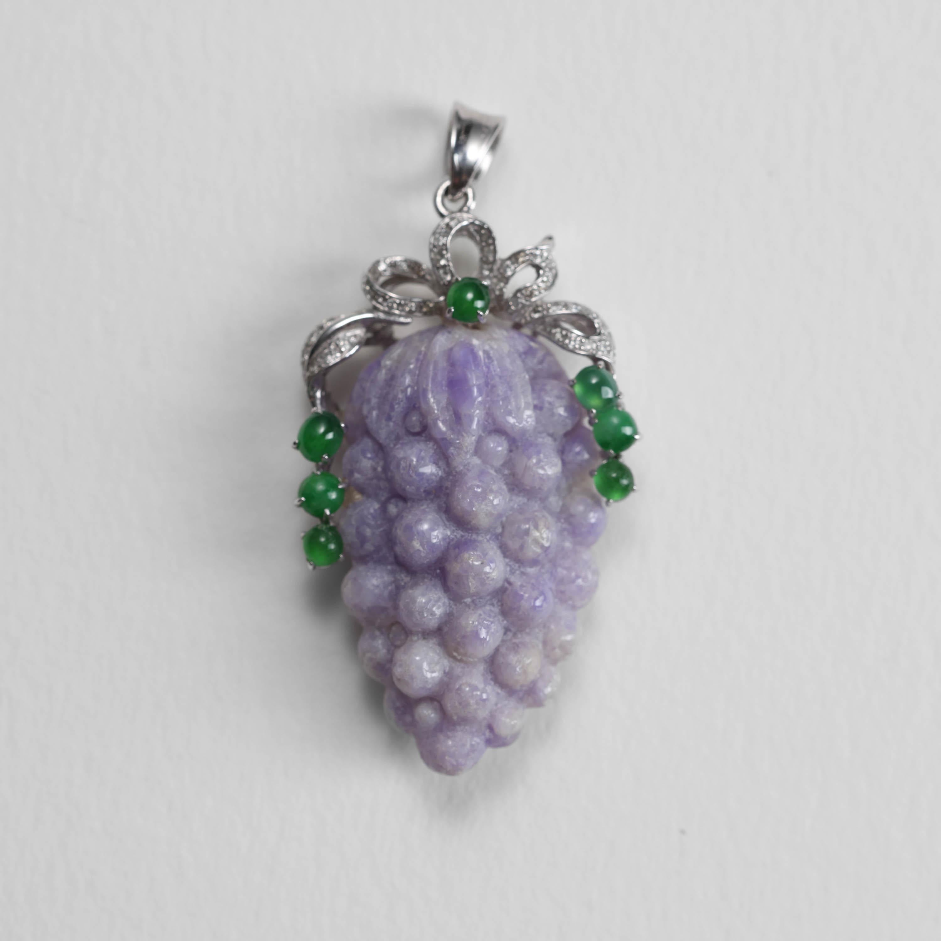 This hand-carved lavender jade pendant is a gorgeous and unusual piece, most likely created in the middle of the previous century (Circa 1950s;1960s). Even though it is opaque like most lavender jade, I photographed it in very low light so that you