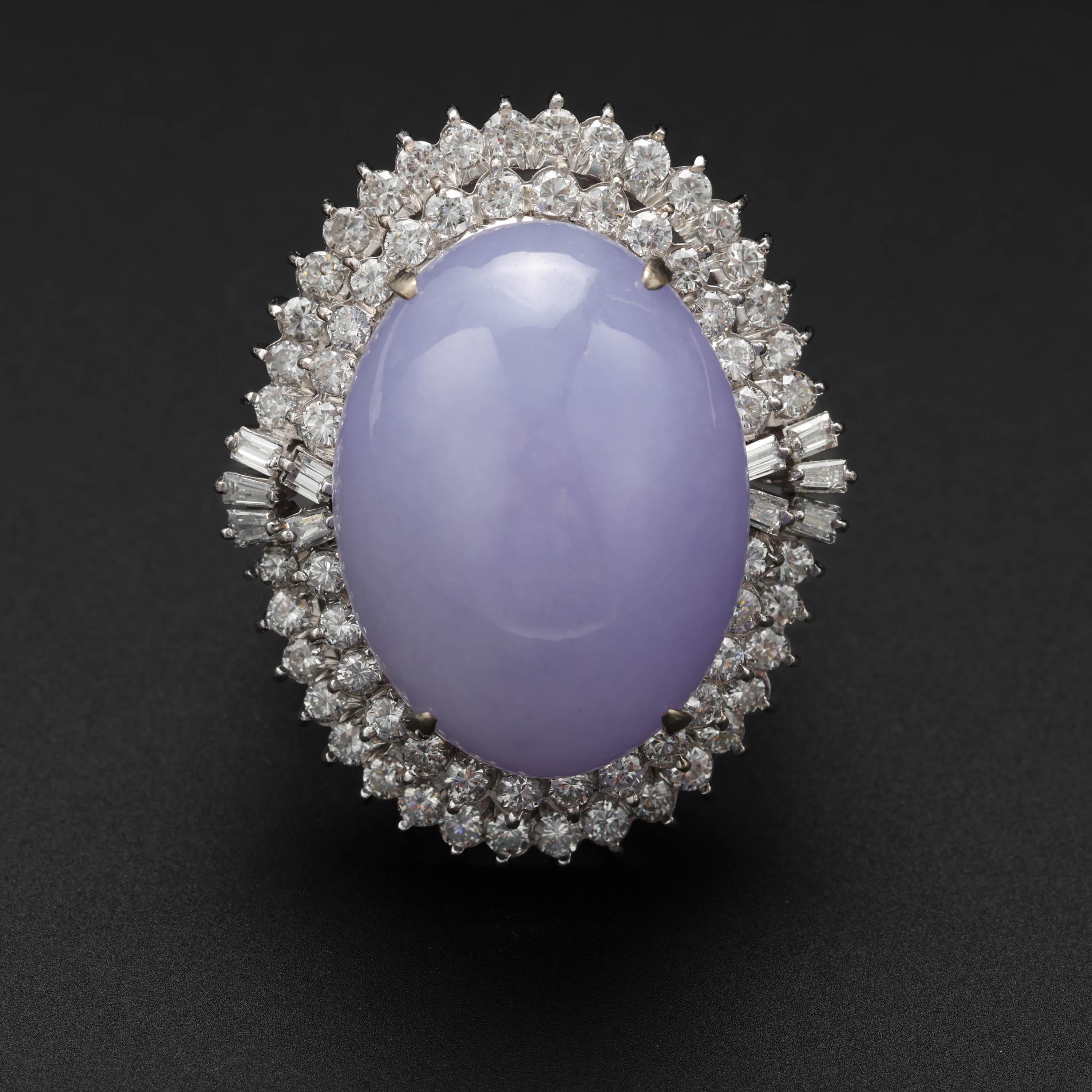 A lush, succulent lavender jade ring from the Mid-century (circa 1960s) like no other. This one-of-a-kind handmade ring features a huge (23.48 x 17.44 x 11.81) double cabochon of luminous, pristine natural and untreated lavender jadeite jade from
