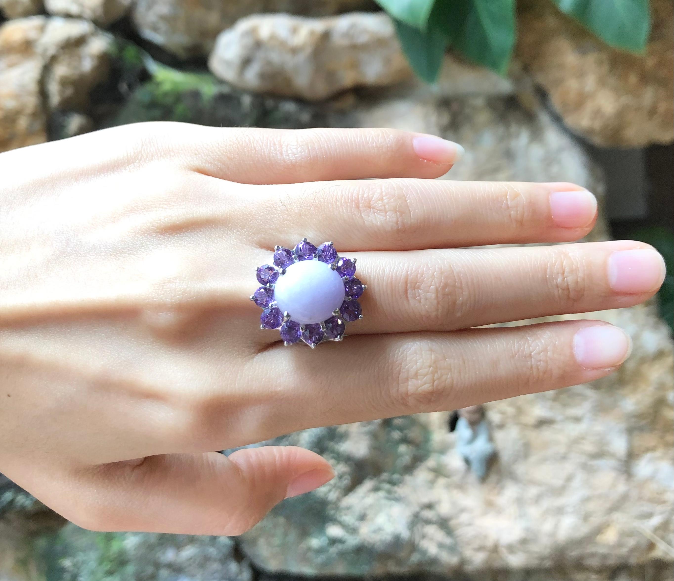 Lavender Jade 9.86 carats with Amethyst 2.90 carats Ring set in 18 Karat White Gold Settings

Width:  1.8 cm 
Length: 2.2 cm
Ring Size: 53
Total Weight: 12.82 grams

