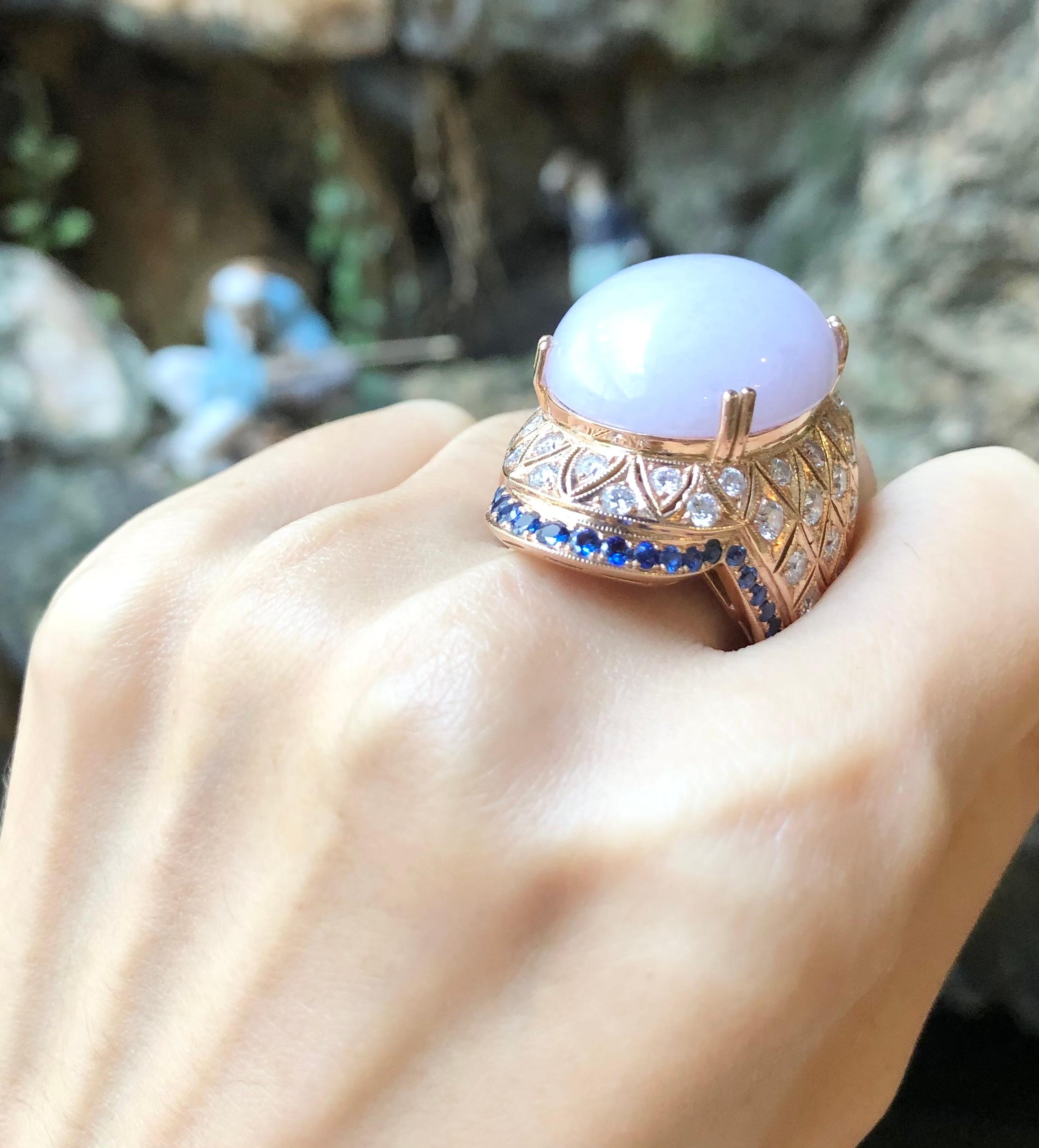 Lavender Jade 45.65 carats with Diamond 1.75 carats and Blue Sapphire 1.10 carats Ring set 18 Karat Rose Gold Settings

Width:  2.5 cm 
Length: 4.1 cm
Ring Size: 58
Total Weight: 34.46grams


