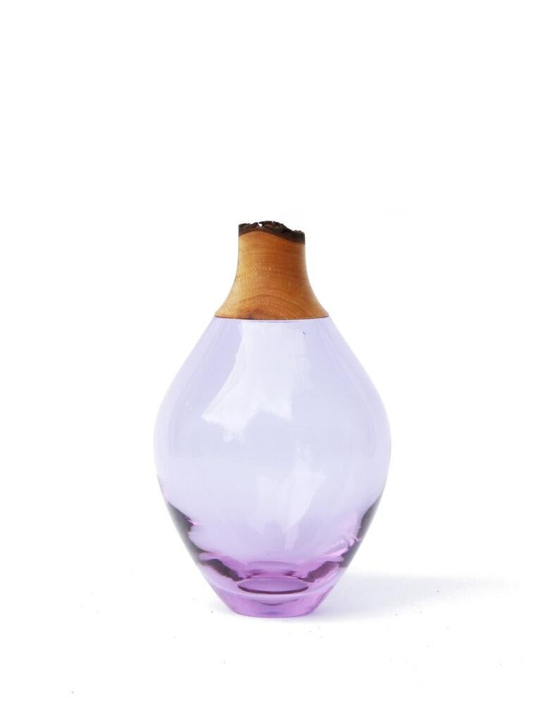 Lavender Matisse stacking vessel III, Pia Wüstenberg
Dimensions: D 11 x H 21
Materials: glass, wood
Available in other colors.

The Matisse stacking vessels are treasures, small splashes of curvy glass with a wooden crown. The collection was