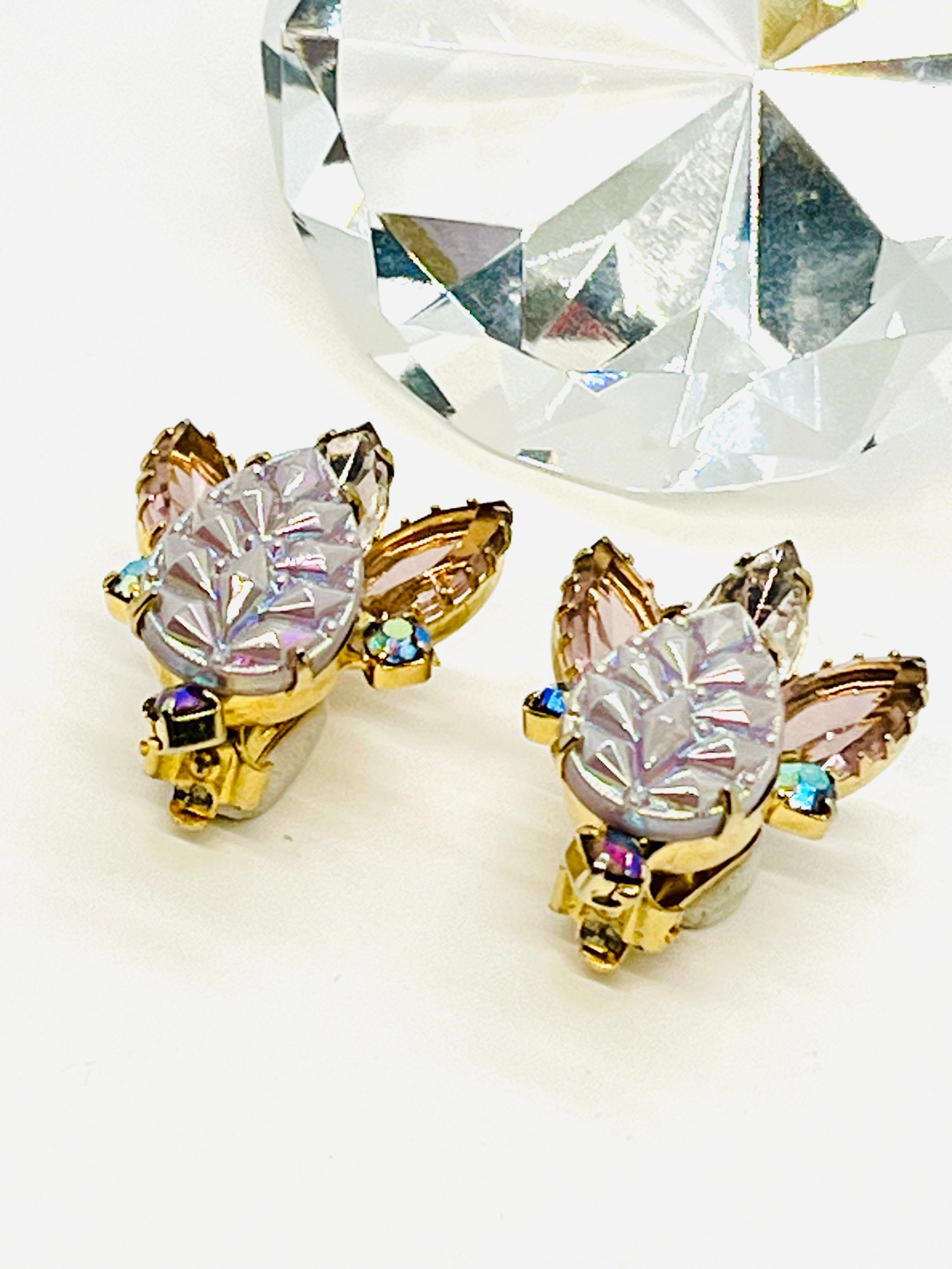 Iridescent Lavender Purple Molded Glass Leaf Earrings, Milk Glass, 3 darker lavender Marquise Rhinestone Cluster radiates from a milk glass, pearlescent, molded glass leaf. Three smaller brilliant cut Aurora Borealis rhinestones give off a blueish/